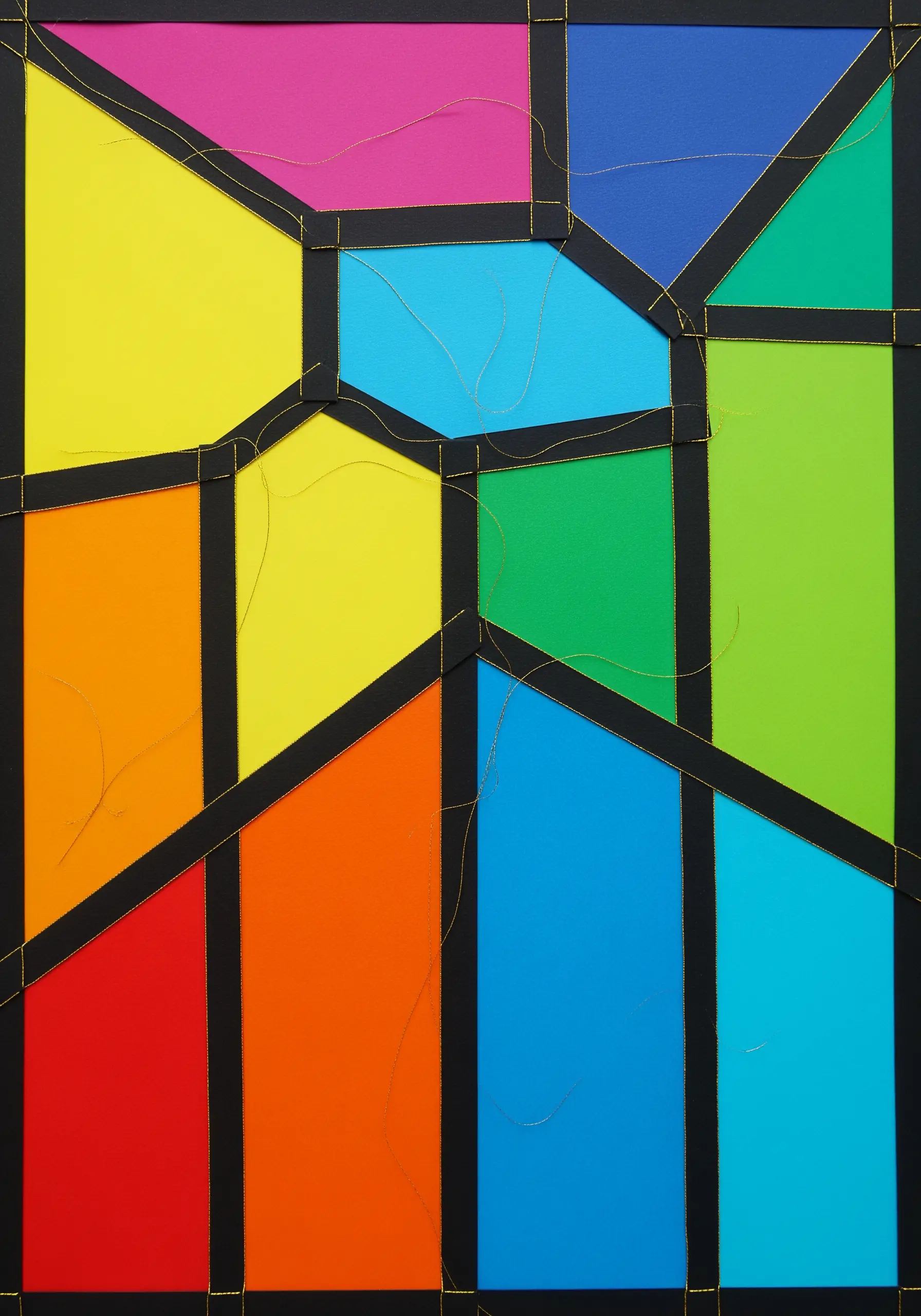 A colorful geometric paper collage on a black background, outlined with gold thread like stained glass.