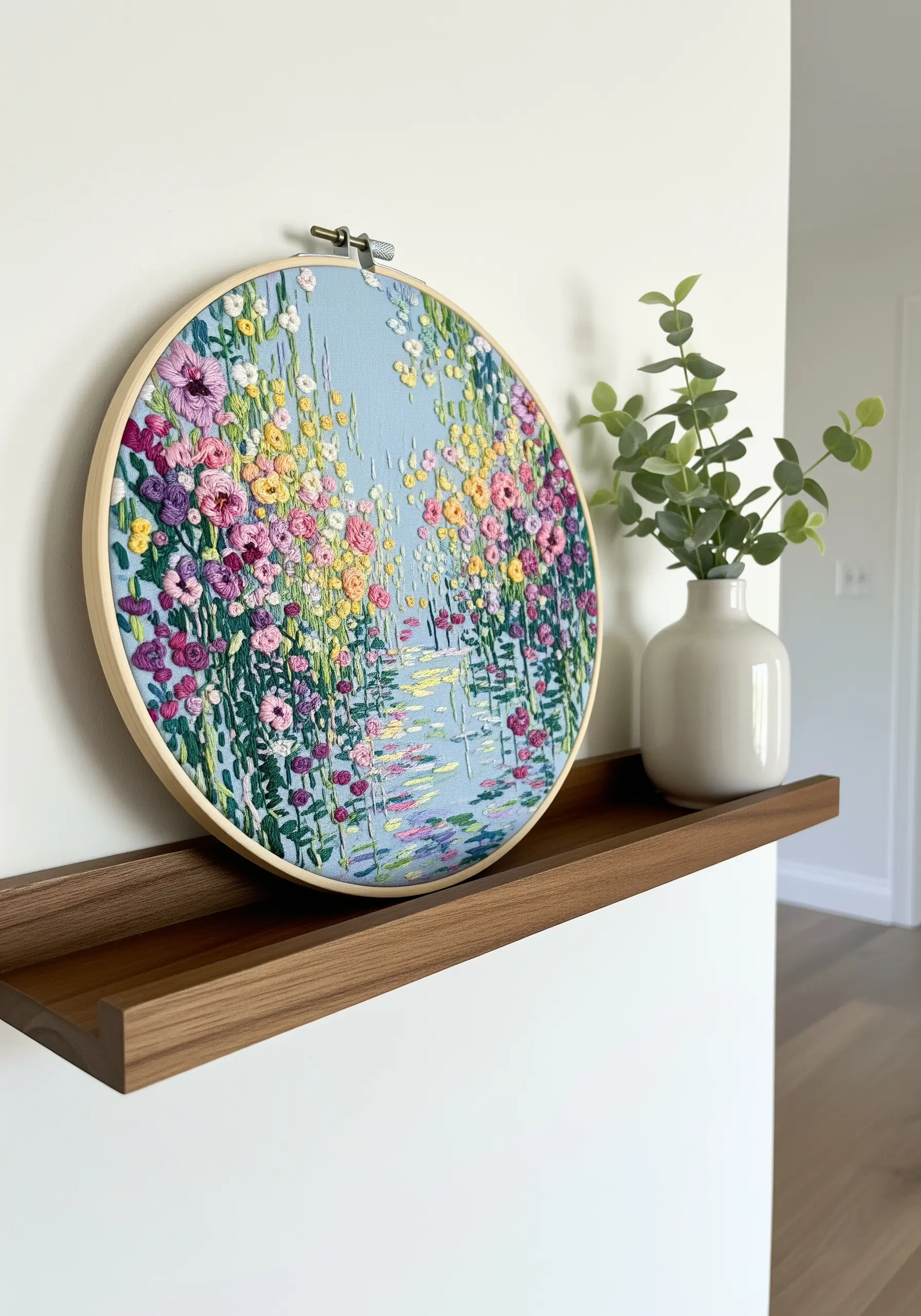 An impressionistic floral landscape embroidery with dense, colorful French knots
