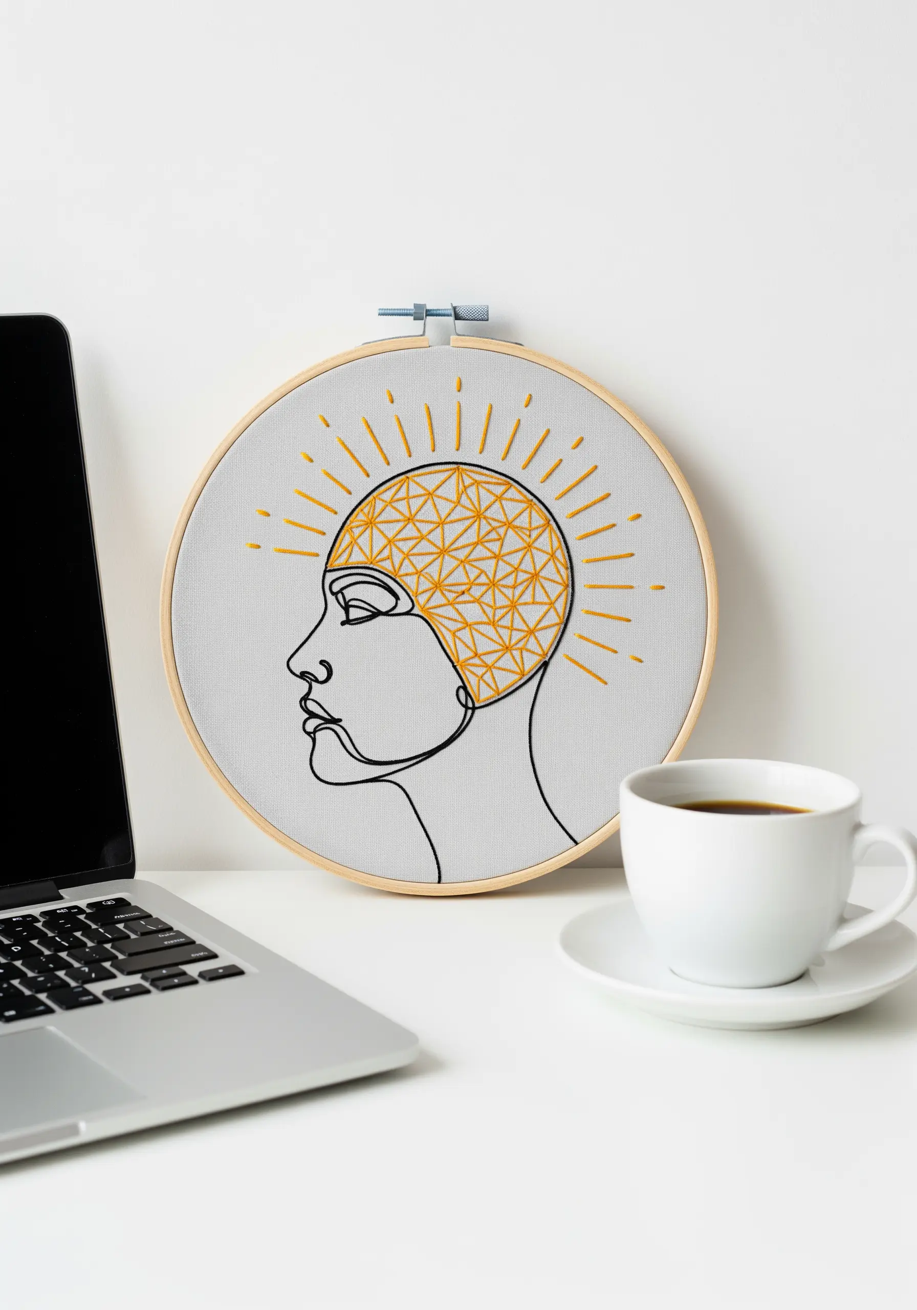 A profile outline filled with a yellow geometric grid, with sun rays radiating from the head.