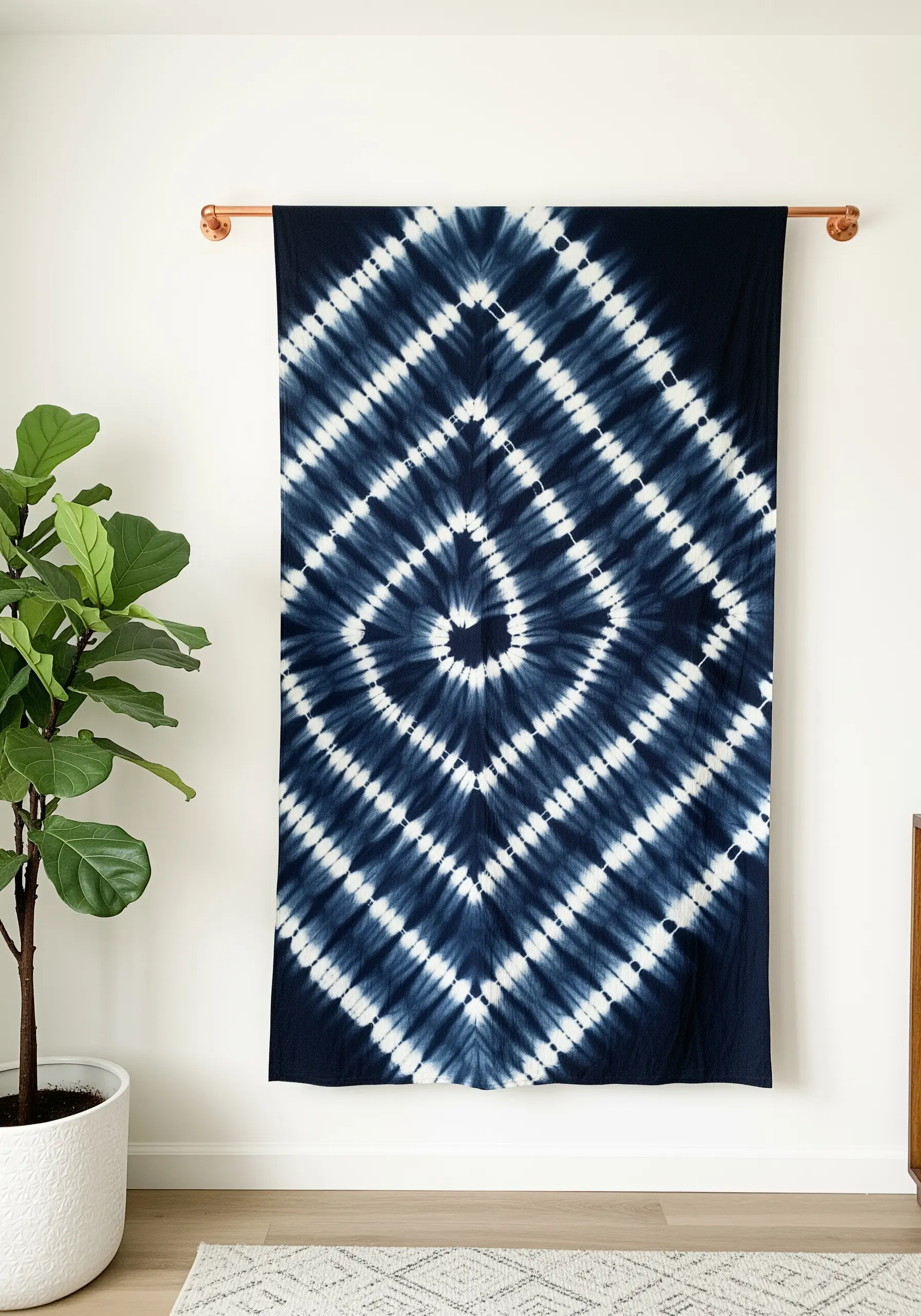 A deep indigo and white Shibori tie-dye wall hanging with a repeating diamond pattern.