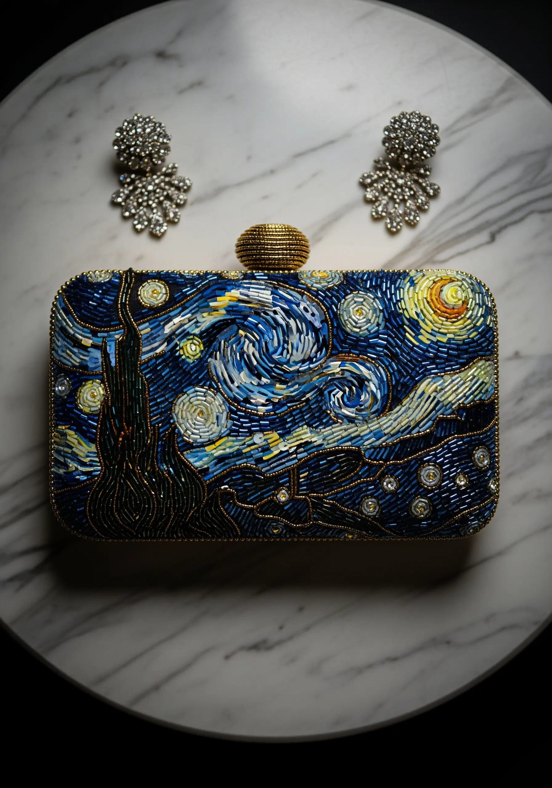 An intricately beaded clutch bag depicting Van Gogh's