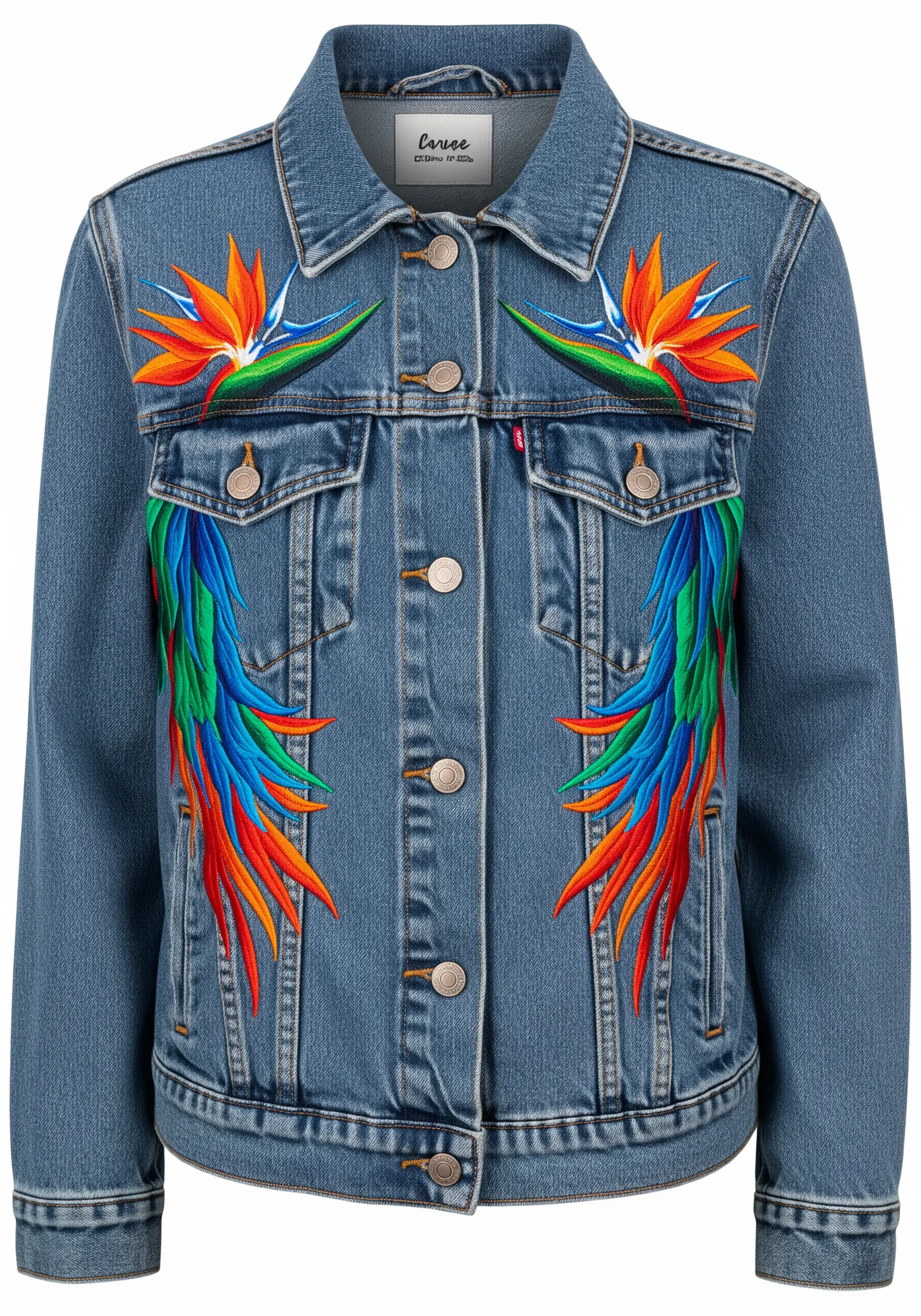 Symmetrical Bird of Paradise flowers and colorful feathers embroidered on the front of a denim jacket.