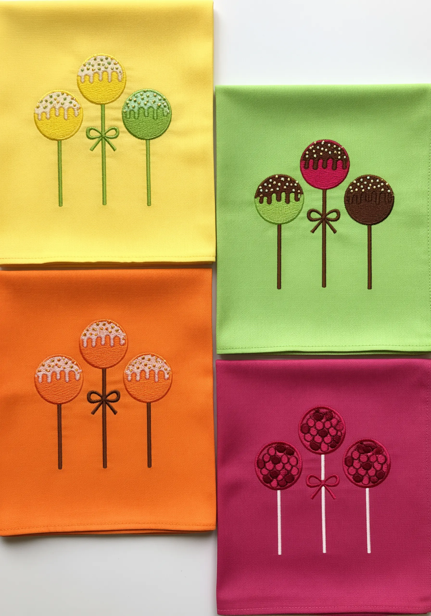 Four sets of embroidered cake pops in different colors with French knot sprinkles.