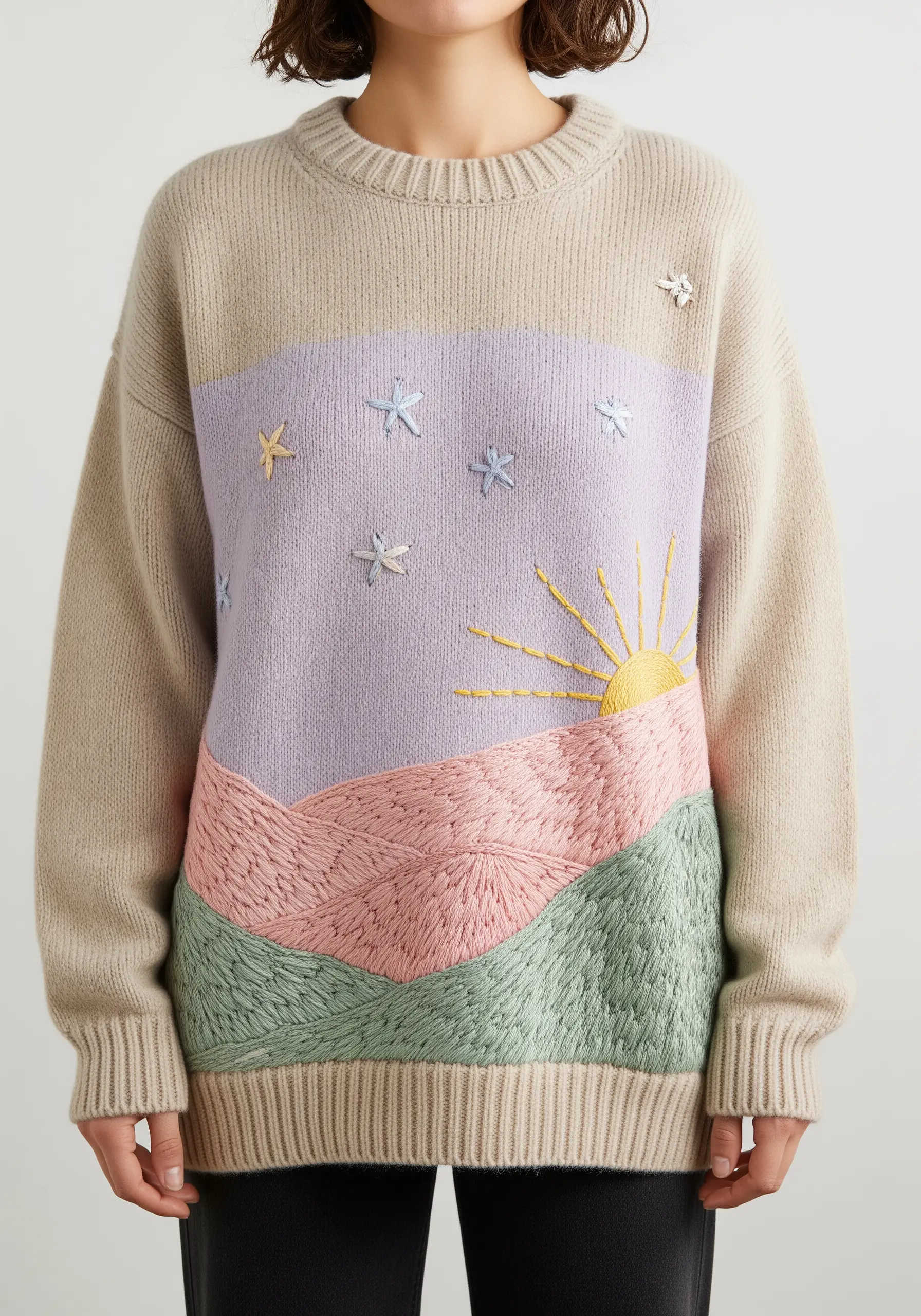 Embroidered landscape with pastel-colored hills, a lavender sky, and a yellow sun.