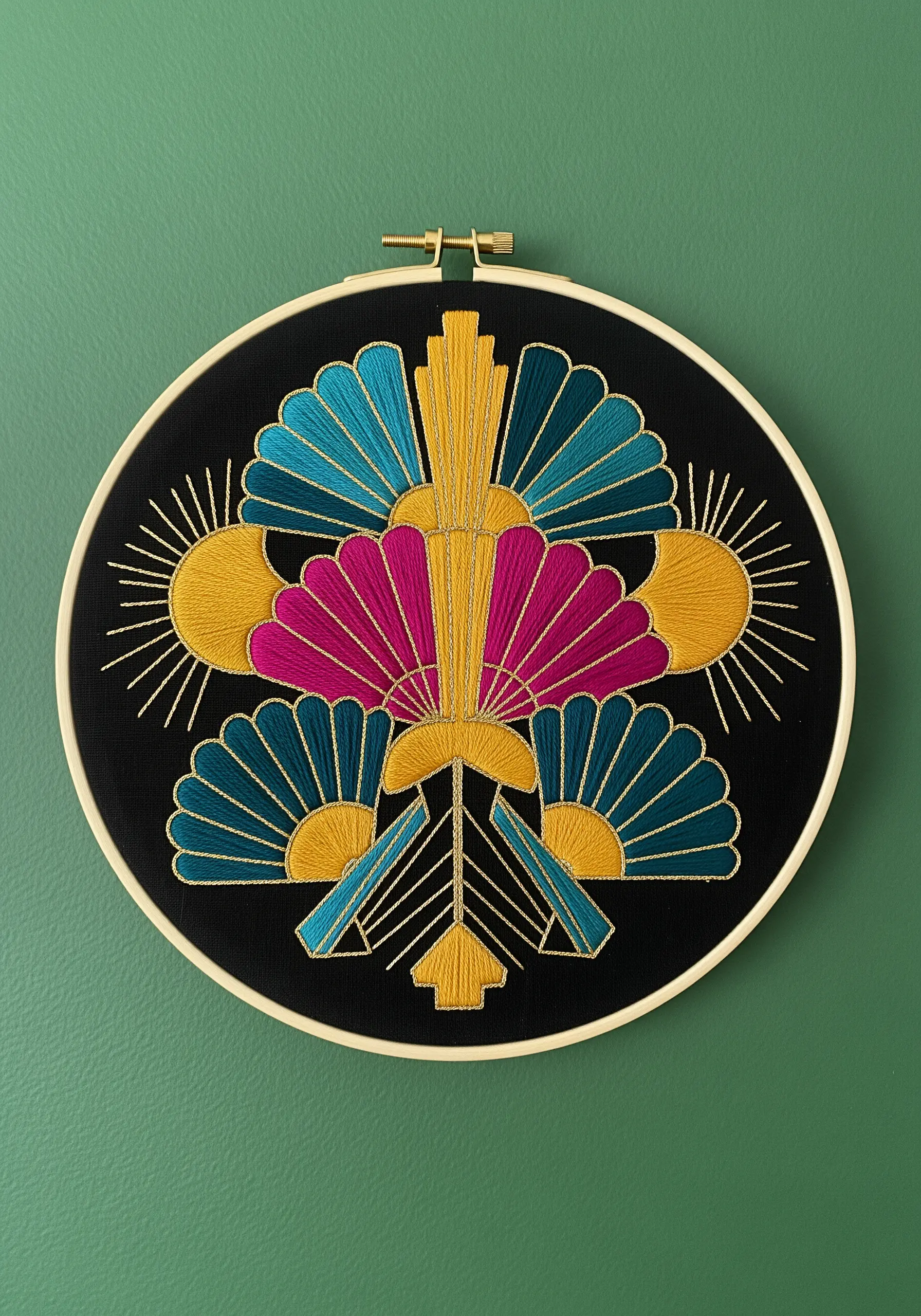 Symmetrical Art Deco embroidery pattern in blue, pink, and yellow on black fabric.