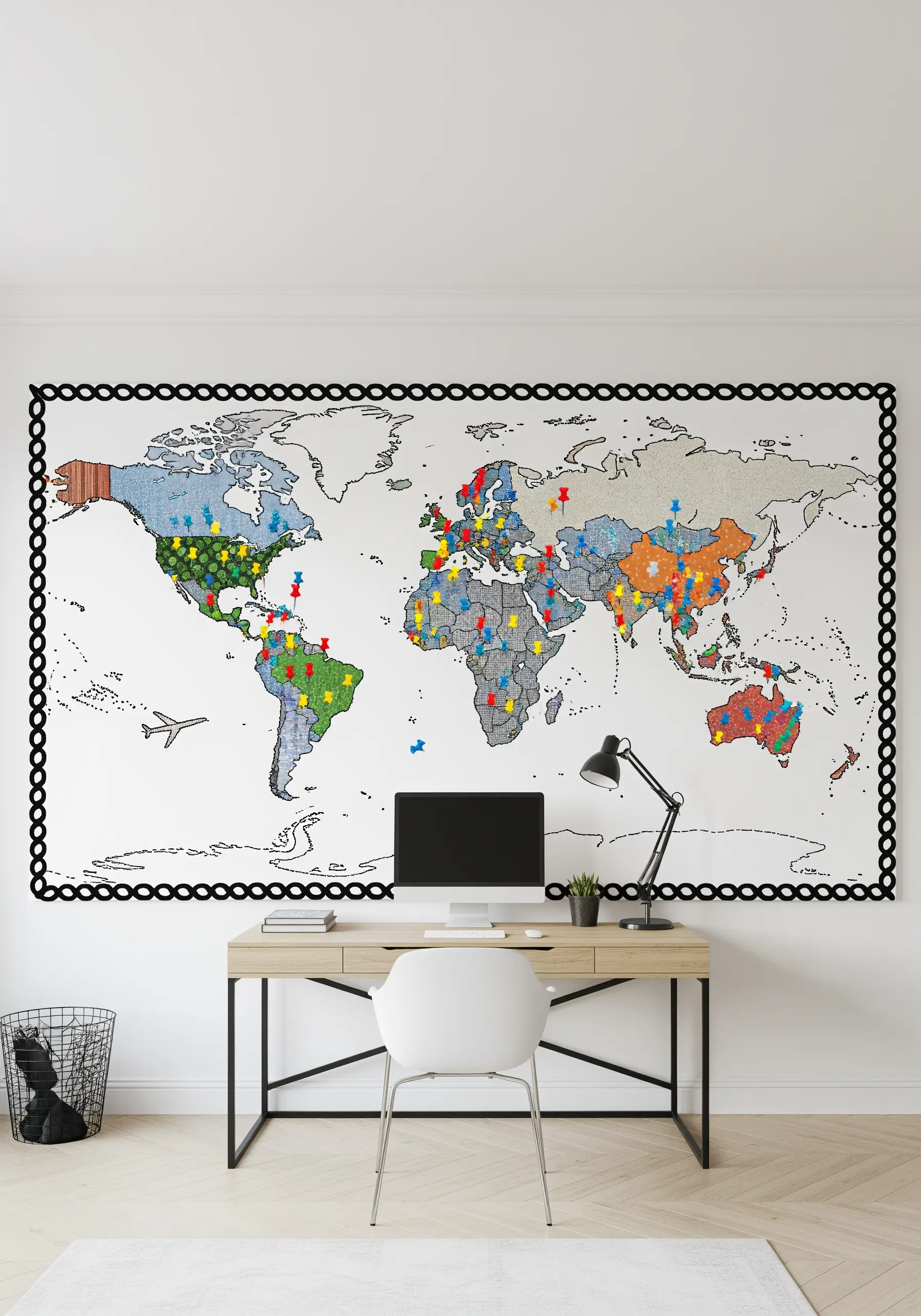 A large, wall-sized embroidered world map with colorful pins marking different locations.