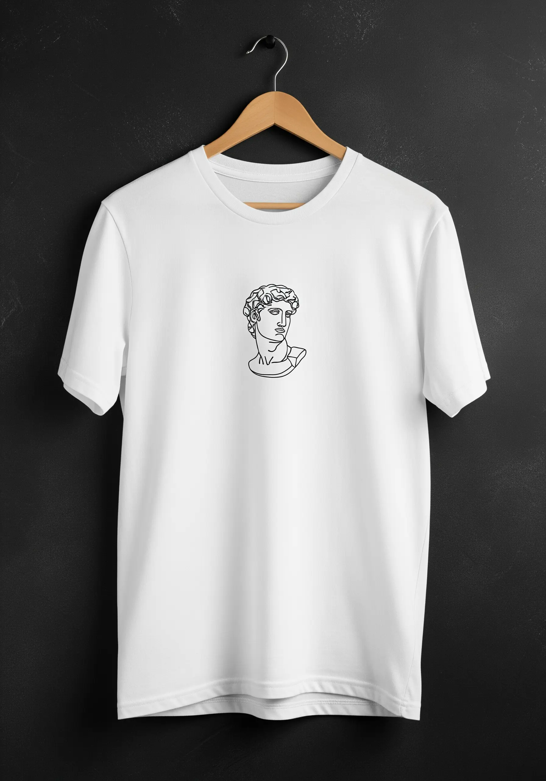 Minimalist black line art embroidery of a classical Greek bust on the center of a white t-shirt.