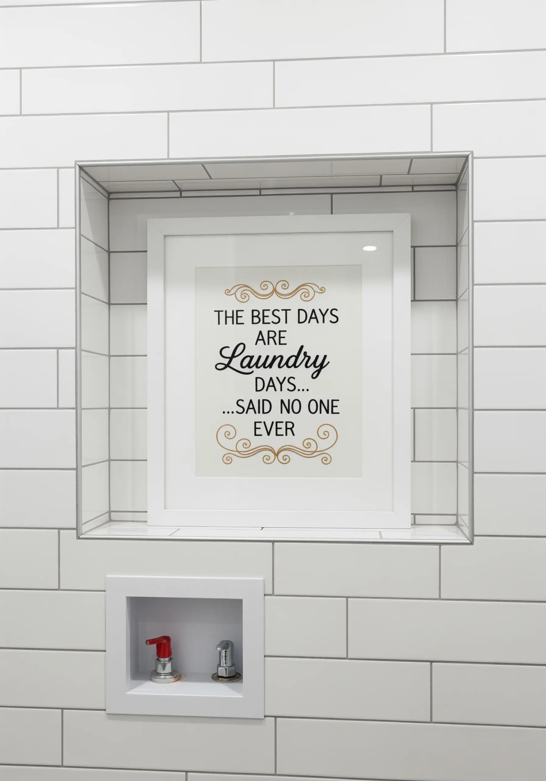 A framed embroidery with a humorous laundry quote in elegant black and gold typography