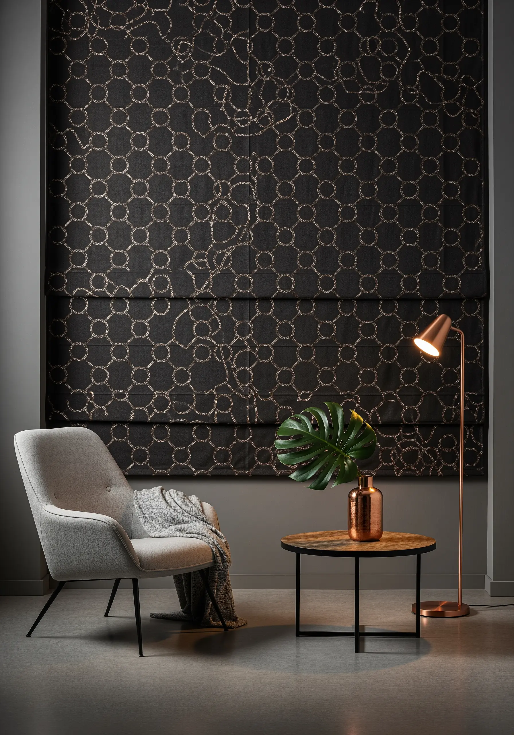 A pattern of interlocking gold rings couched onto a black Roman blind.