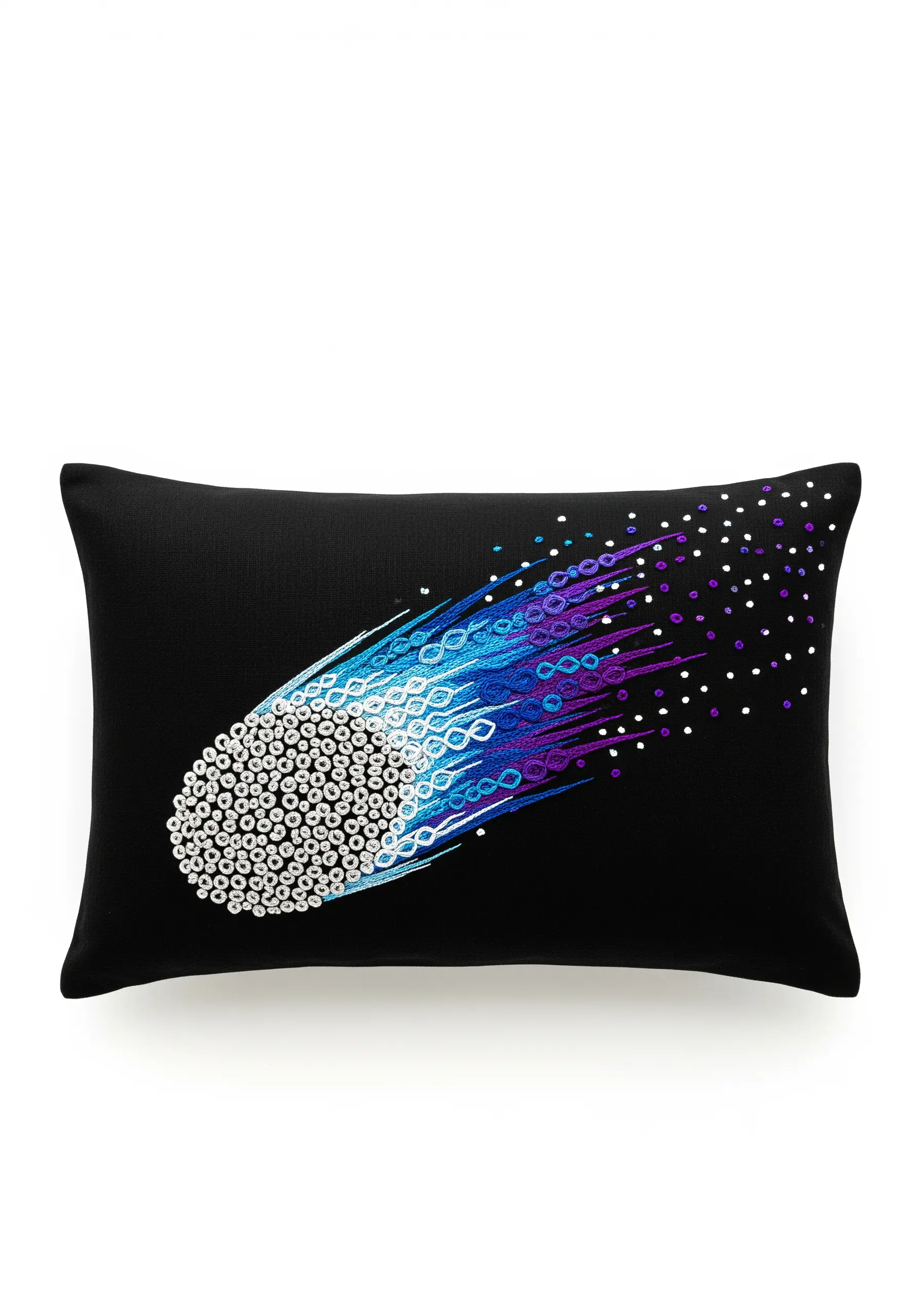A comet embroidered with sequins and a blue-to-purple gradient tail on a black cushion.