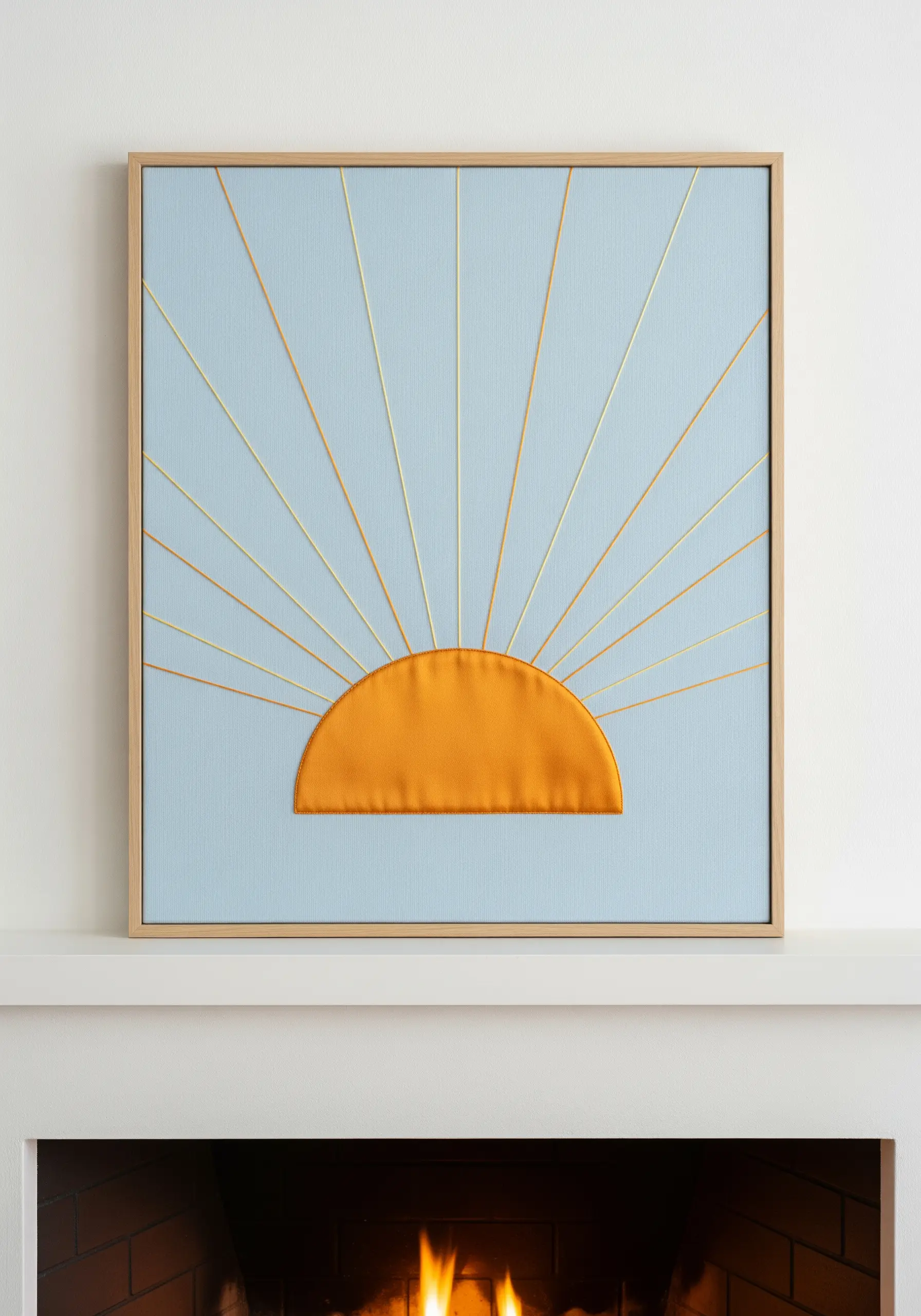 A minimalist sunrise with a satin-stitched sun and long, radiating rays.