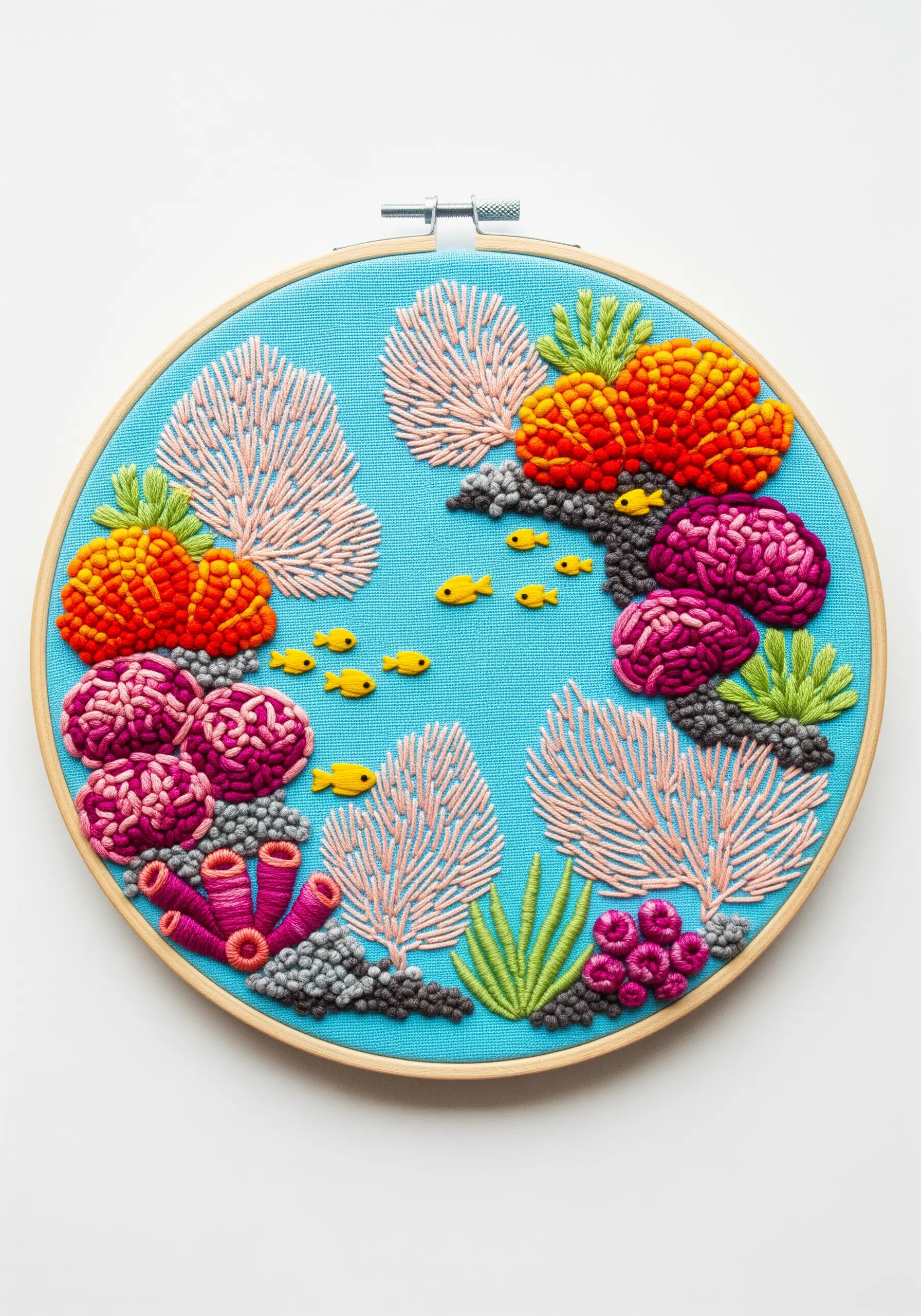 High-texture coral reef embroidery with French knots, bullion knots, and straight stitches.