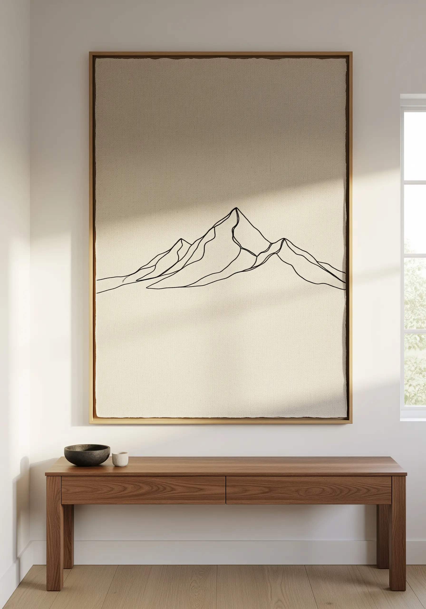 Minimalist mountain range stitched in a single continuous black line on beige linen.