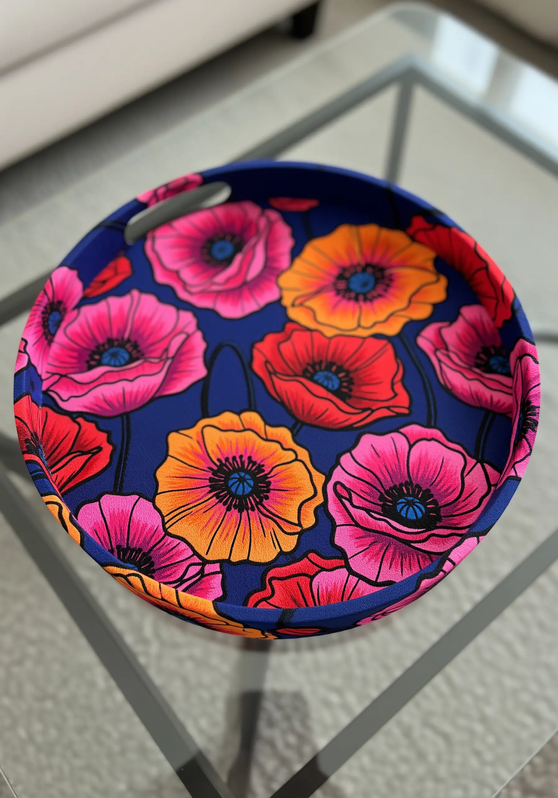 A bold, colorful tray printed with a vibrant, graphic poppy pattern.