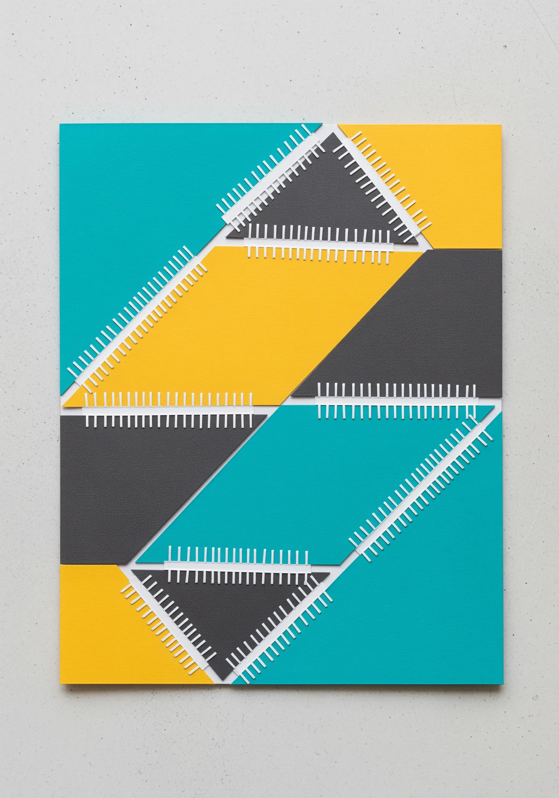 A geometric abstract collage with teal, yellow, and black shapes edged with white paper fringe.
