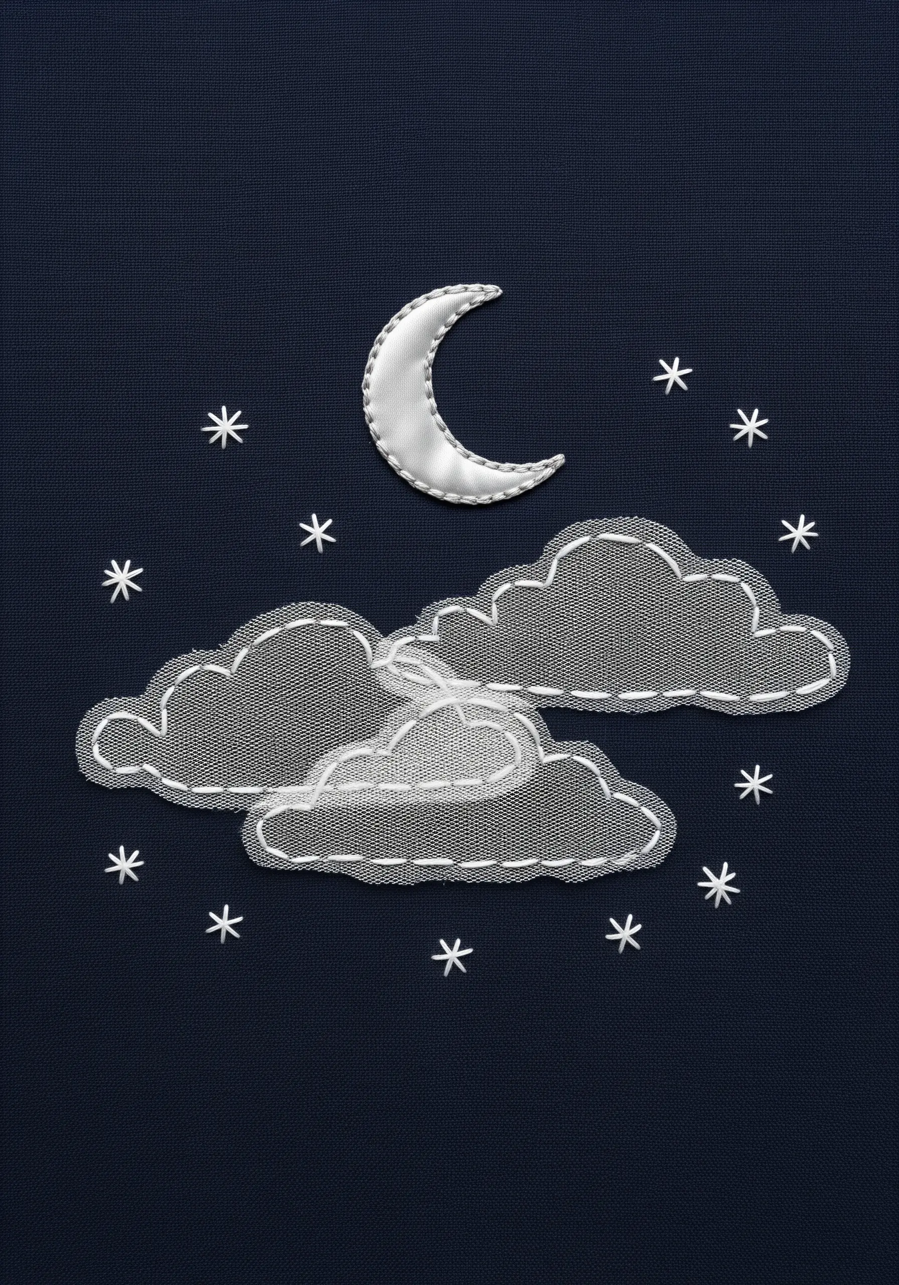 Moon and cloud applique embroidery on dark blue fabric