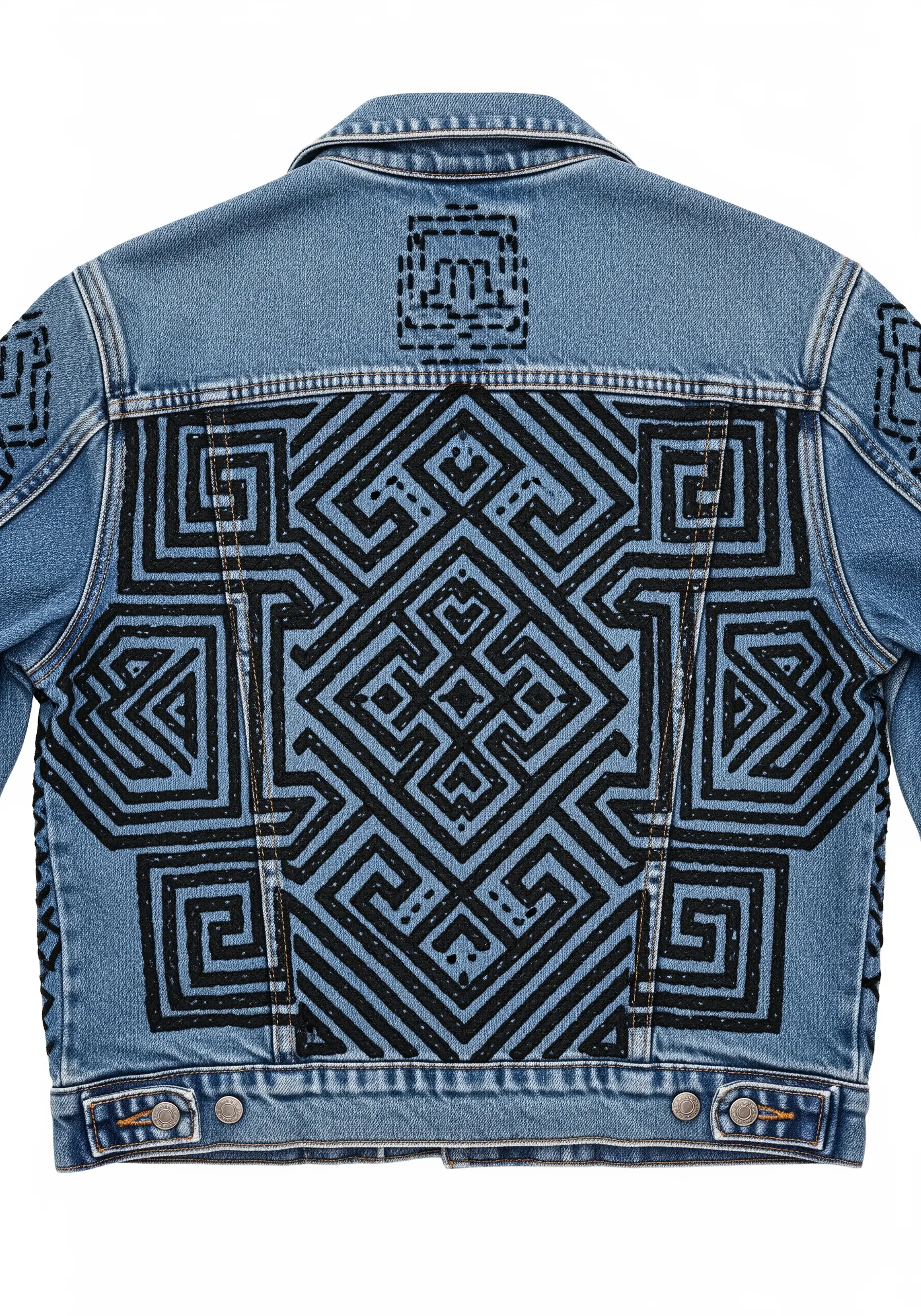 A geometric labyrinth-like pattern stitched in thick black thread on the back of a denim jacket.