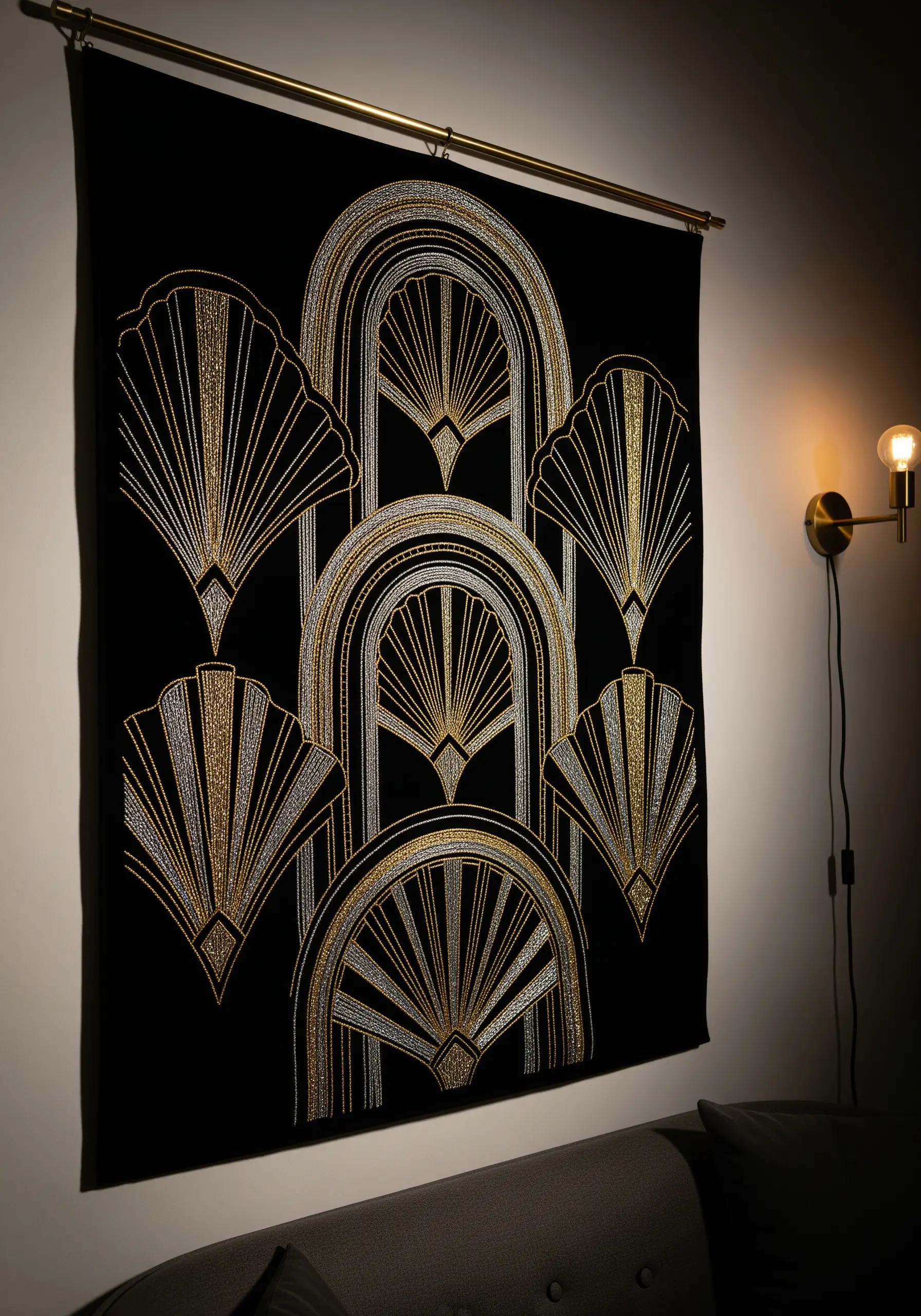 Art Deco-style embroidered tapestry with gold and silver metallic threads on black fabric.