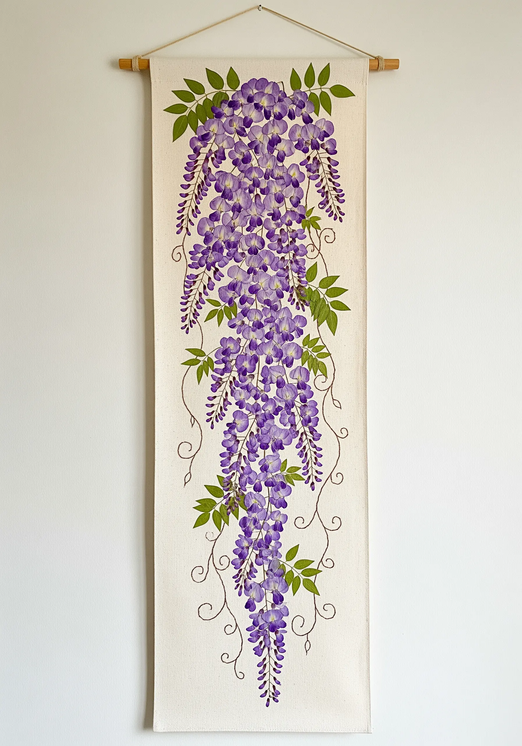 A long wall hanging featuring painted or embroidered wisteria flowers cascading downwards.