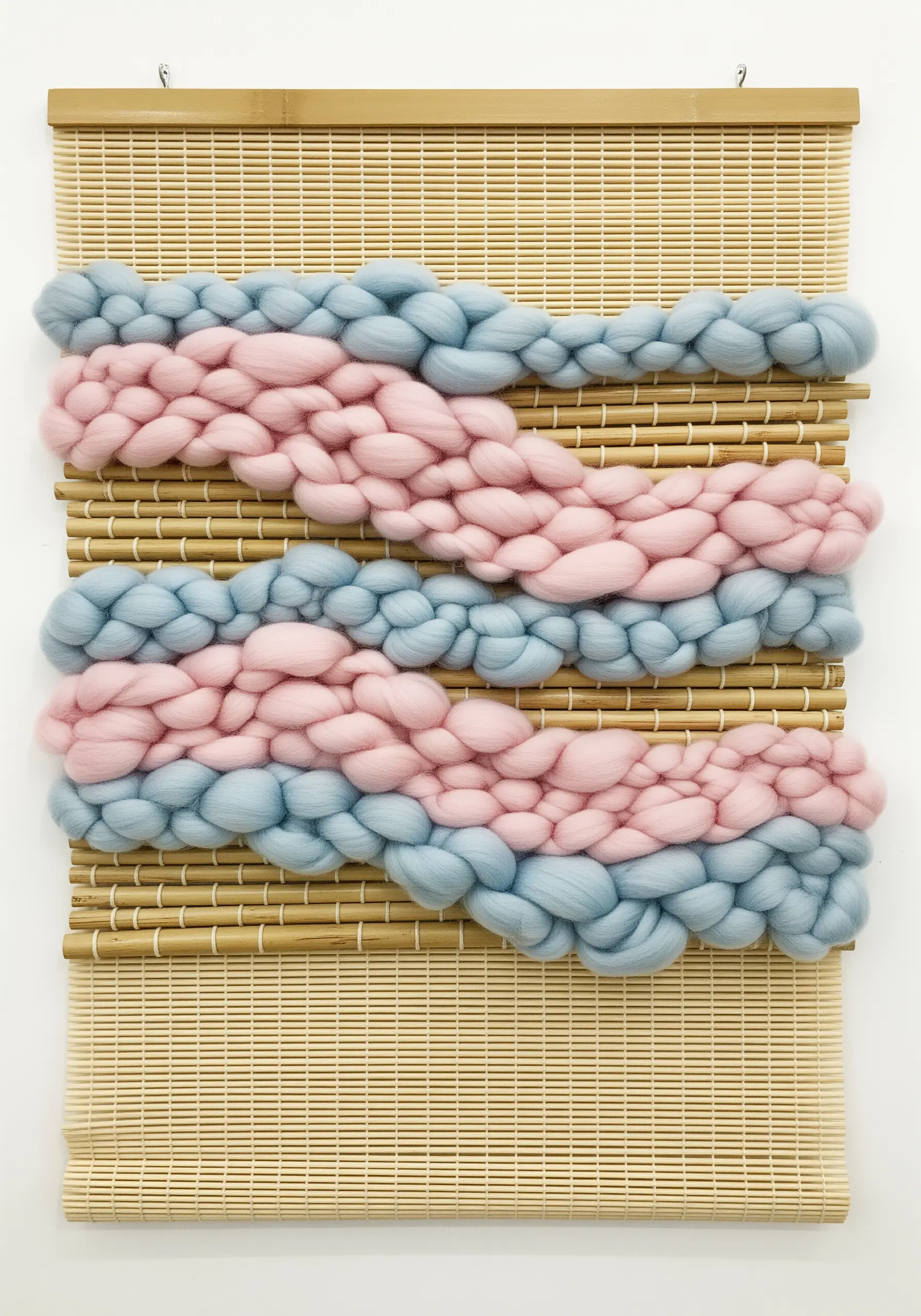 Bamboo blind woven with chunky pink and blue wool roving
