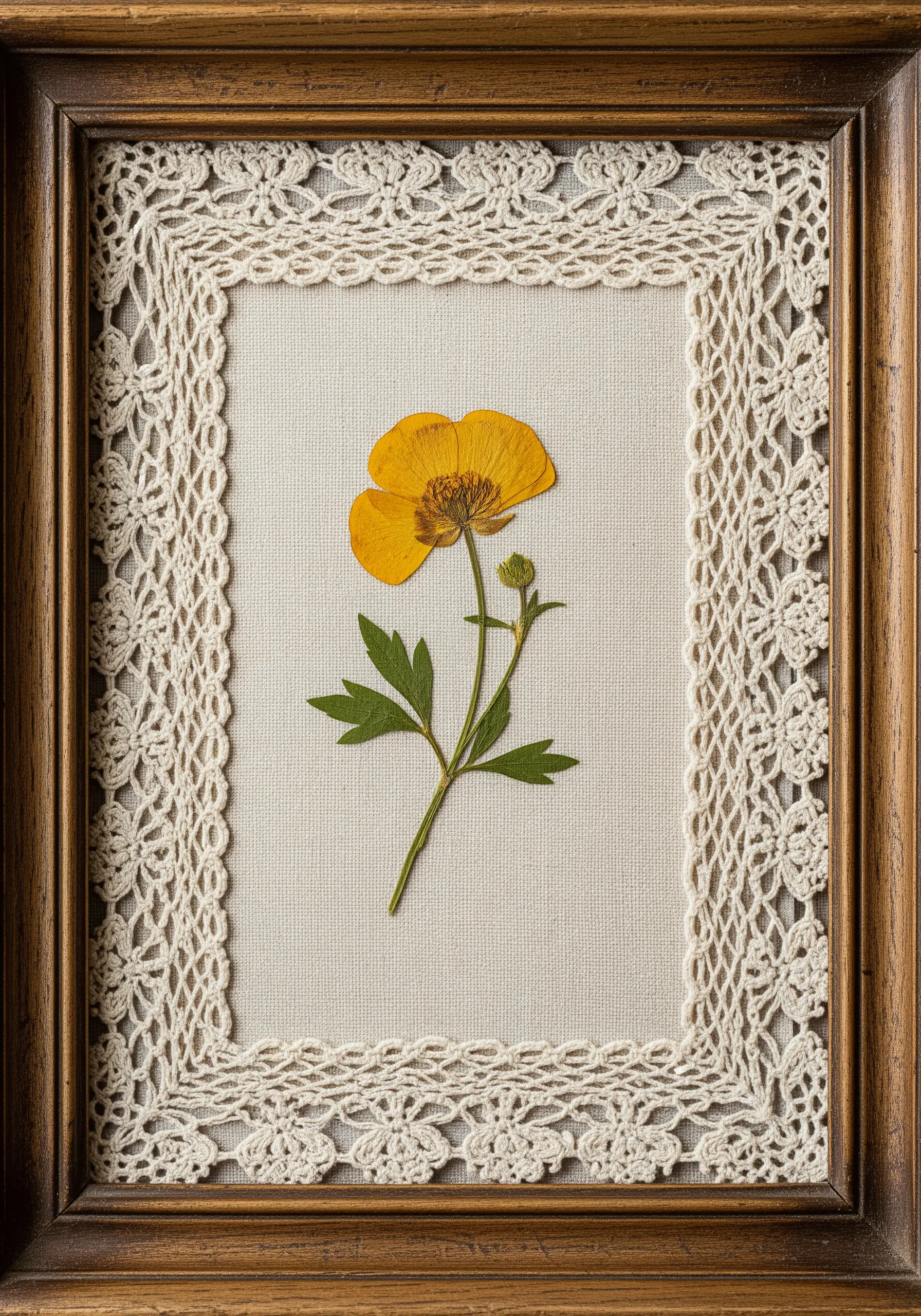 Yellow flower framed with a crochet lace border inside wood