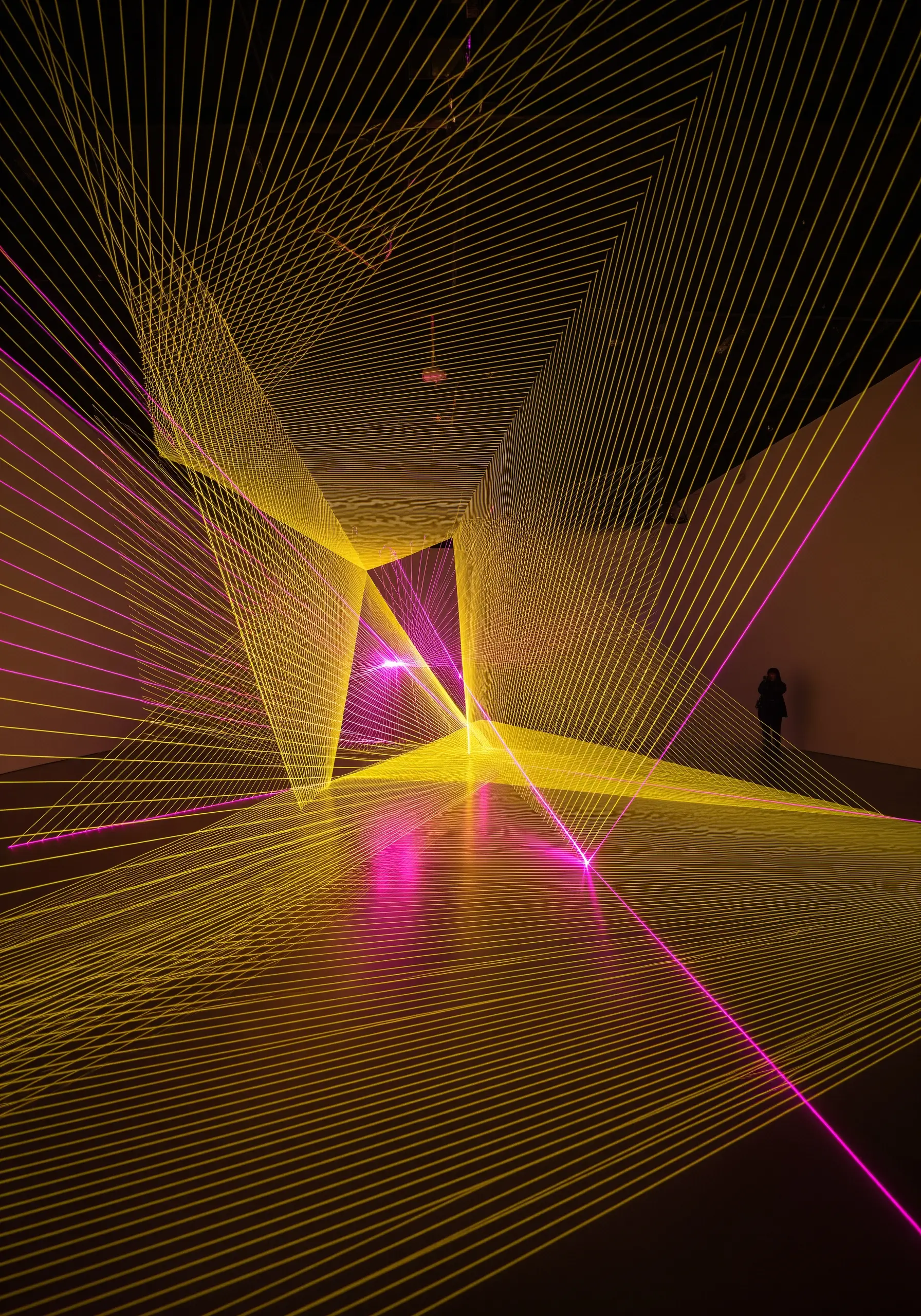 A geometric cube created with precise backstitch lines of varying weights.