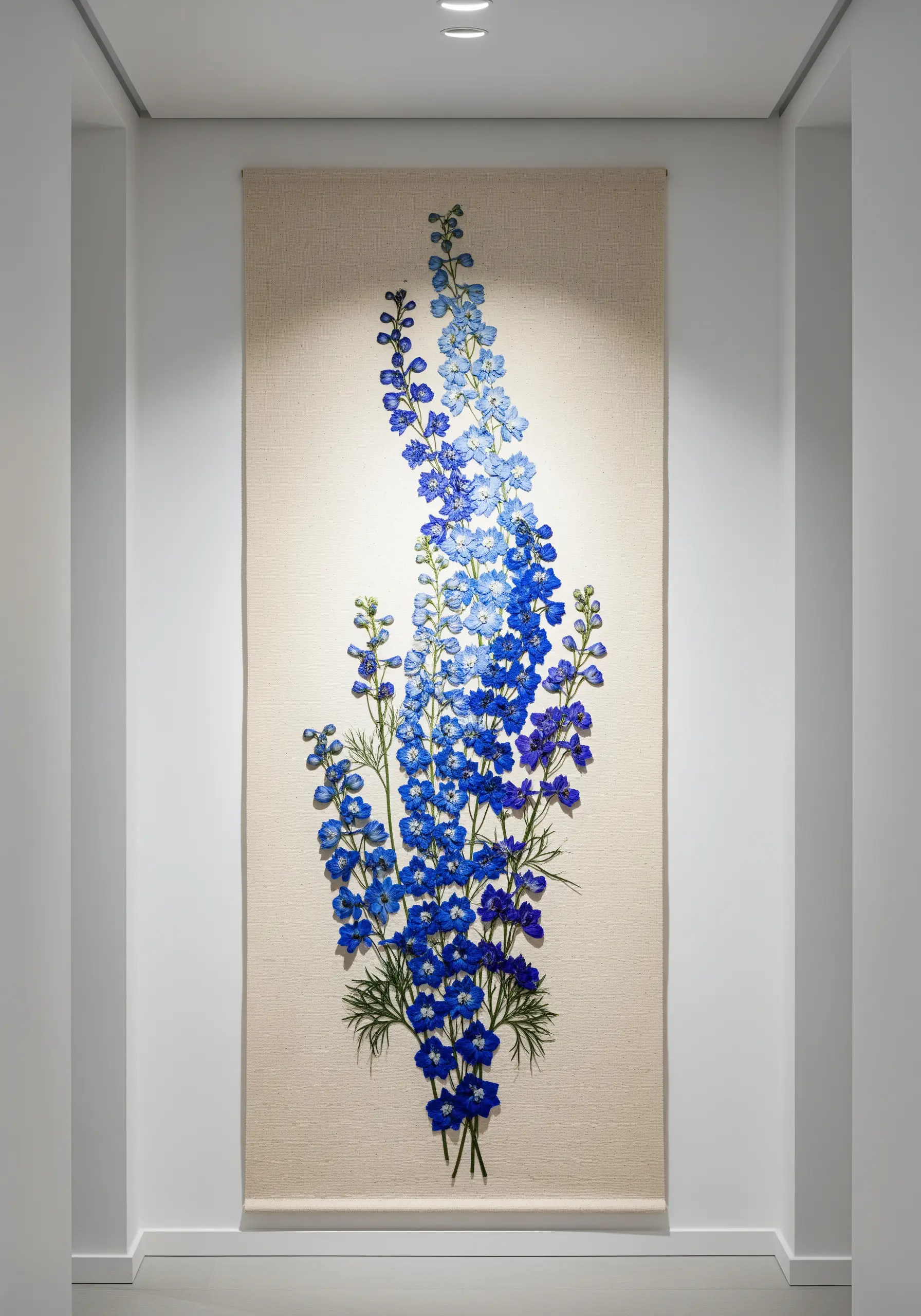 A large-scale textile wall hanging featuring a tall delphinium stalk with a blue gradient.