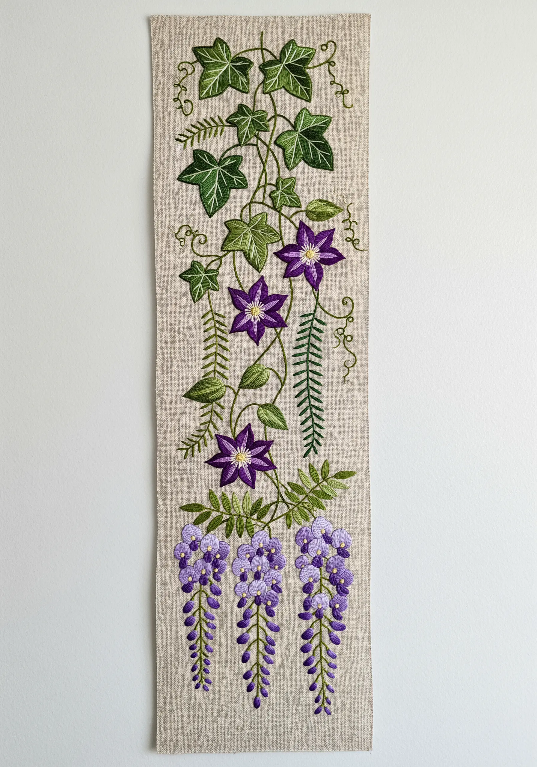 A vertical embroidery banner featuring climbing vines like ivy, clematis, and wisteria.