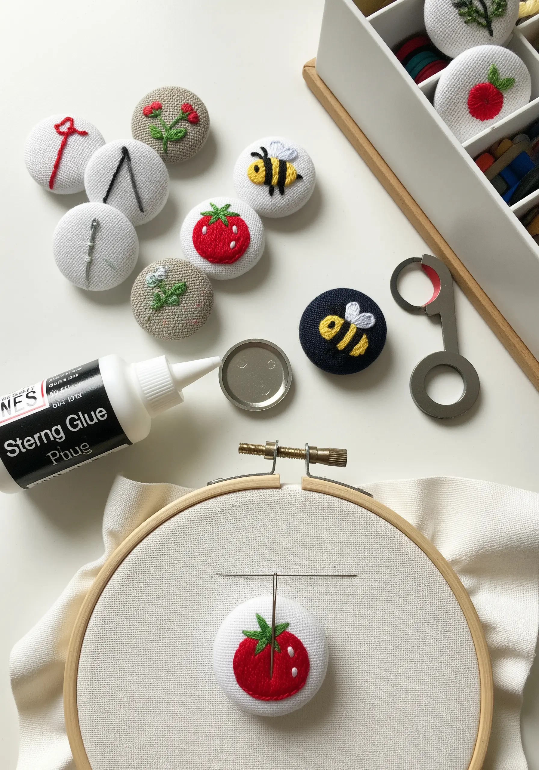 Creating small embroidered covered buttons with motifs like bees, strawberries, and flowers.