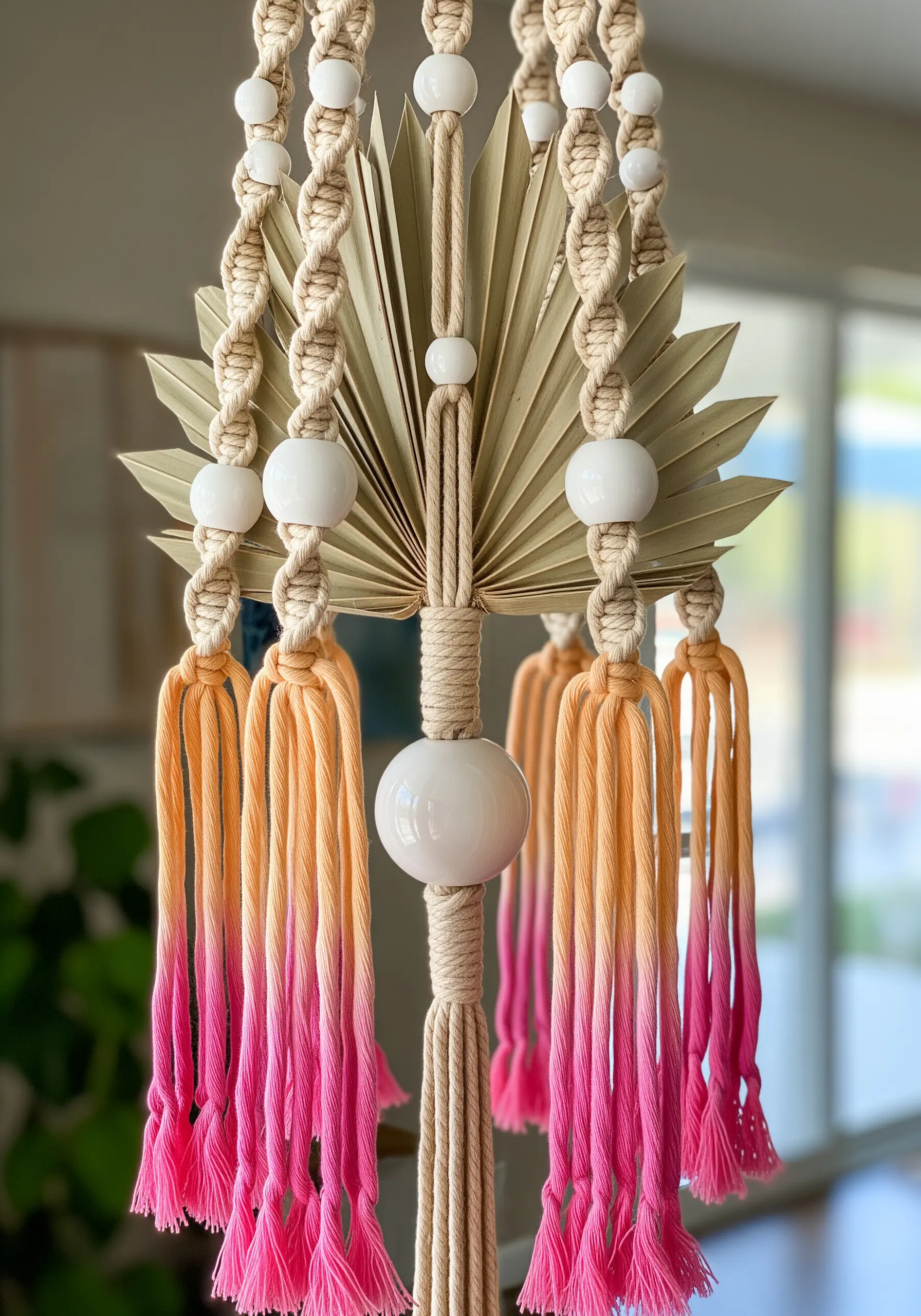 Macramé chandelier with dried palm leaves and ombre dip-dyed tassels