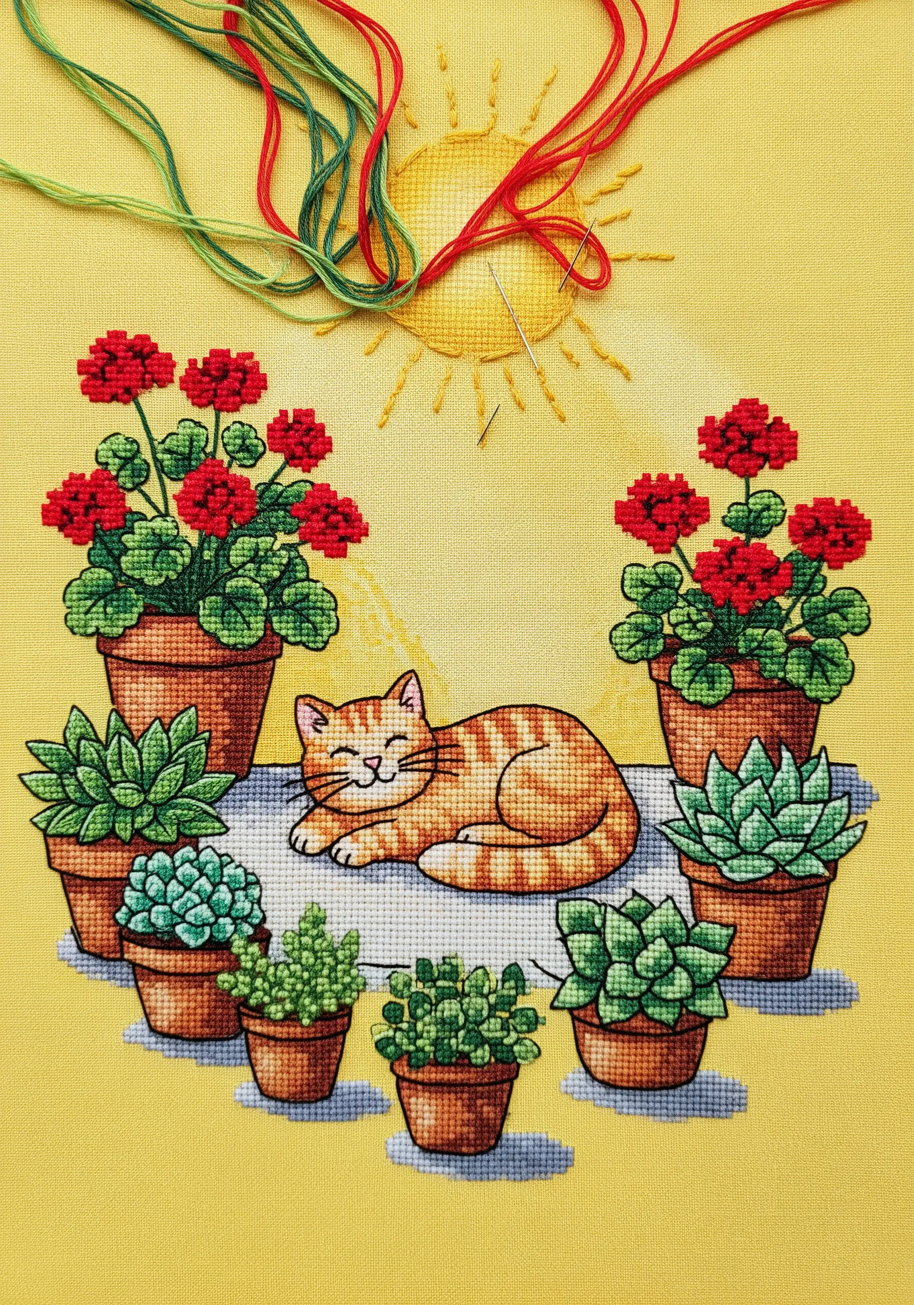 Cross-stitch of a ginger cat sleeping among potted plants under a sun.