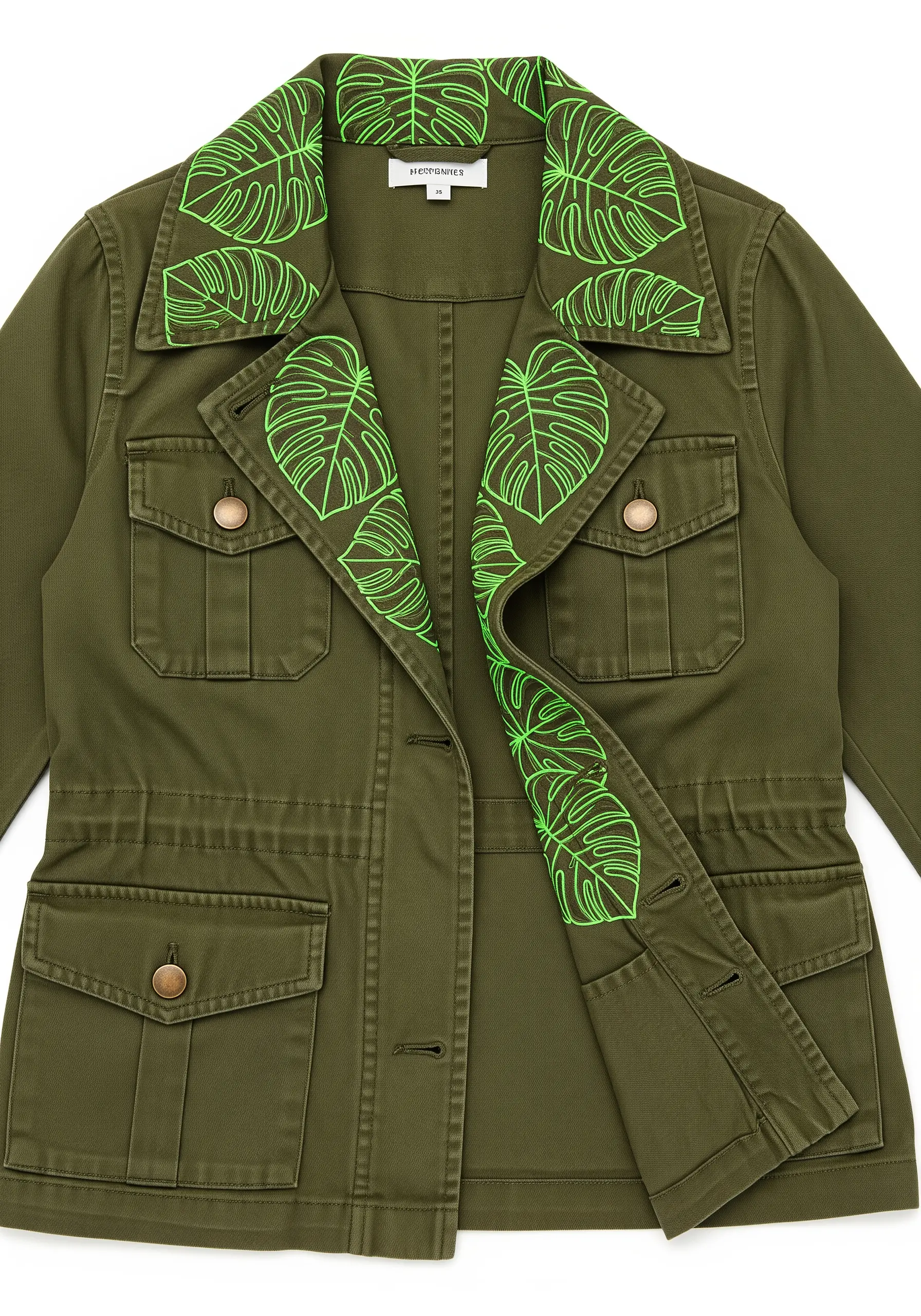 Neon green Monstera leaf outlines embroidered on the collar of an olive green jacket.