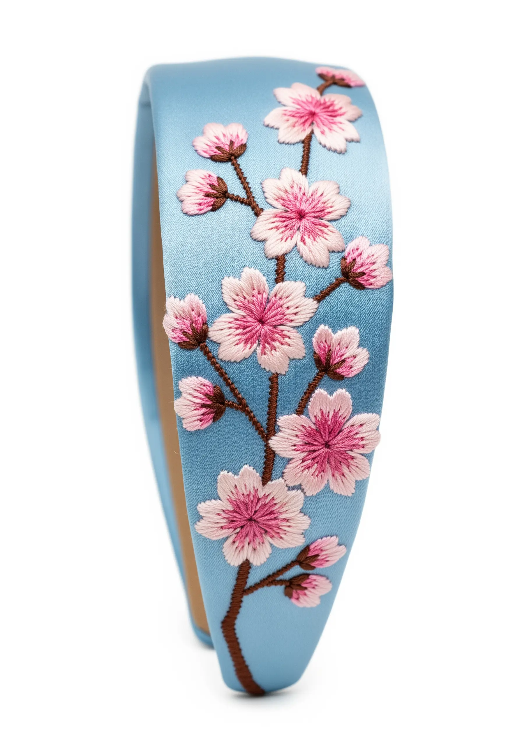 Shaded pink cherry blossoms on blue headband
