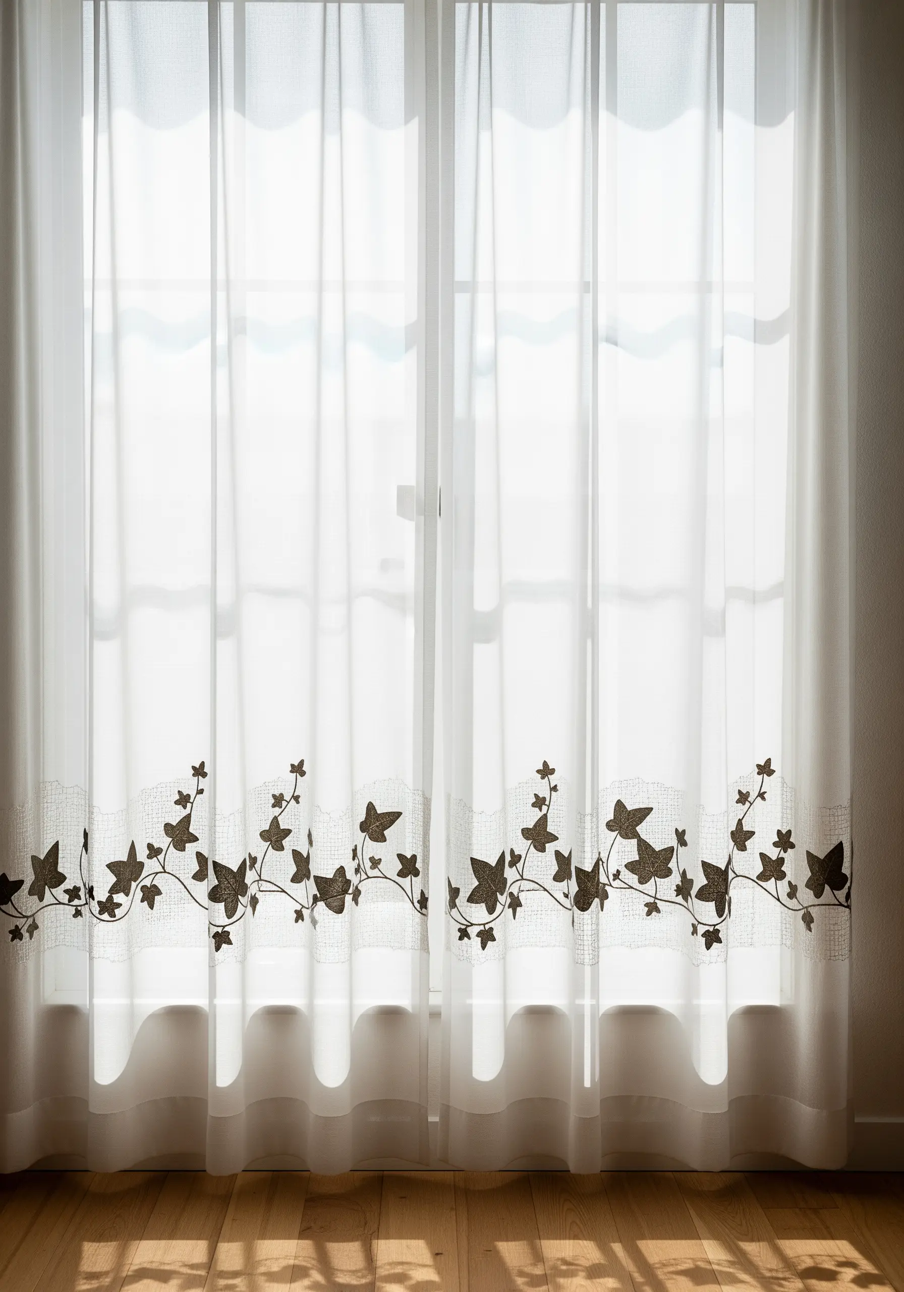 Sheer white curtains with a delicate, embroidered ivy vine border along the bottom.