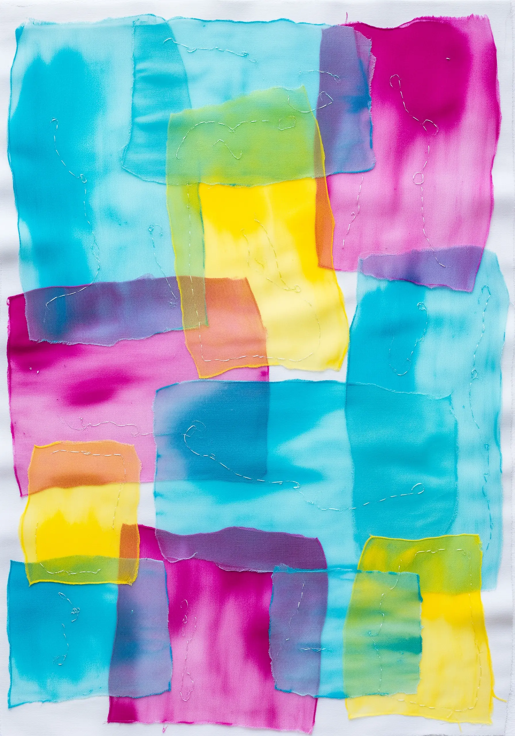 A vibrant collage of overlapping sheer organza in shades of blue, pink, and yellow, creating new colors.
