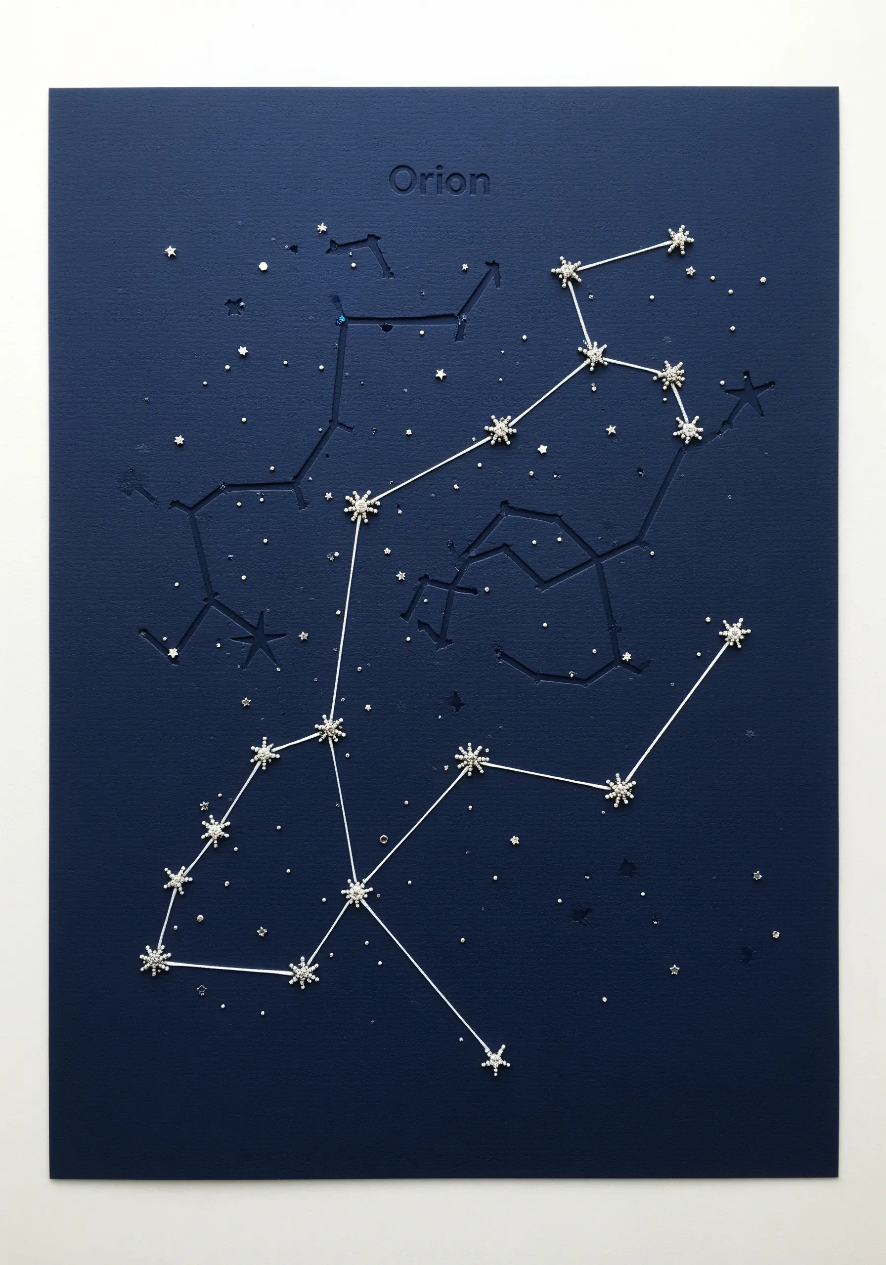 The Orion constellation rendered on dark blue paper using pierced holes and fine stitched lines.