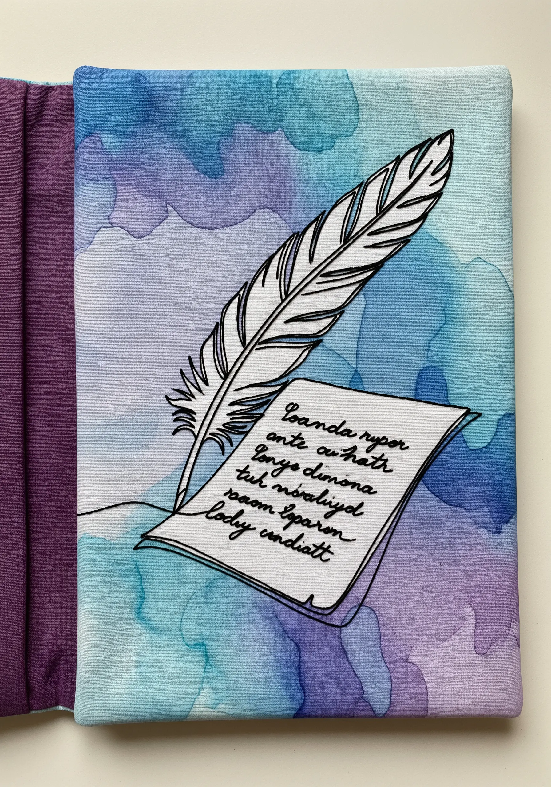 Feather quill and paper embroidery on blue and purple watercolor fabric
