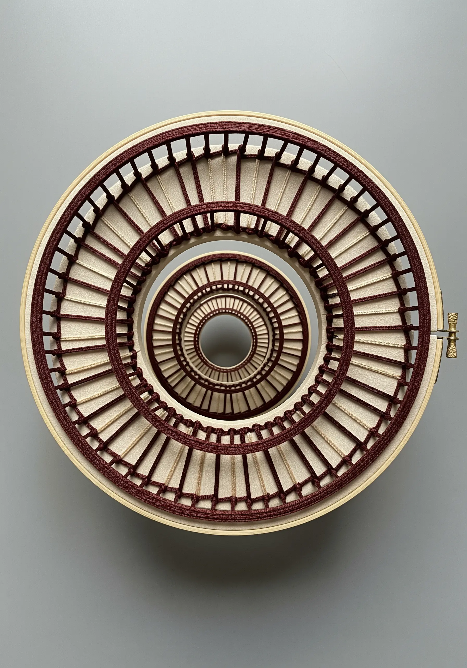 Spiral architectural embroidery resembling a rotunda ceiling