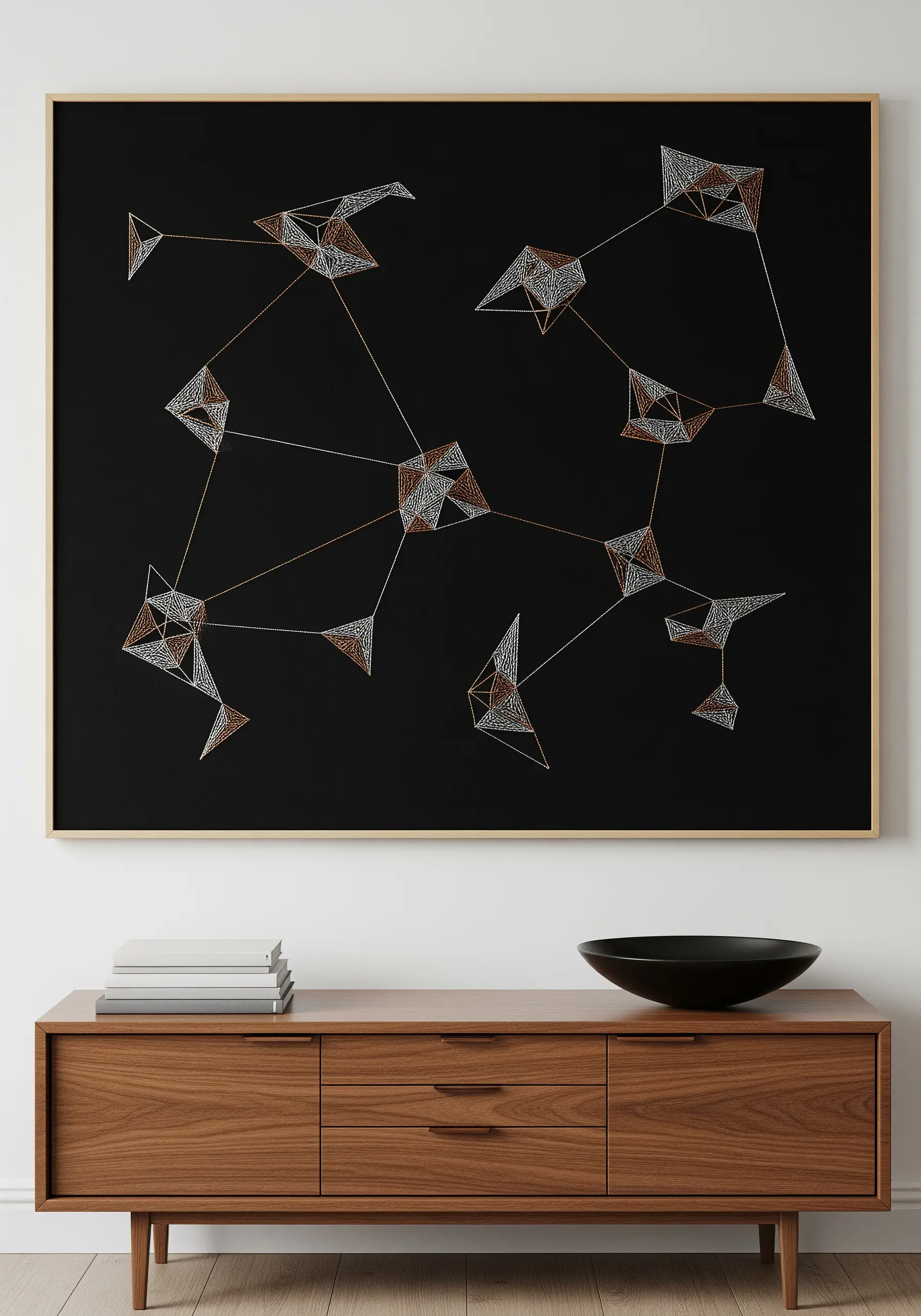 Large-scale geometric thread art with metallic details on a black background.