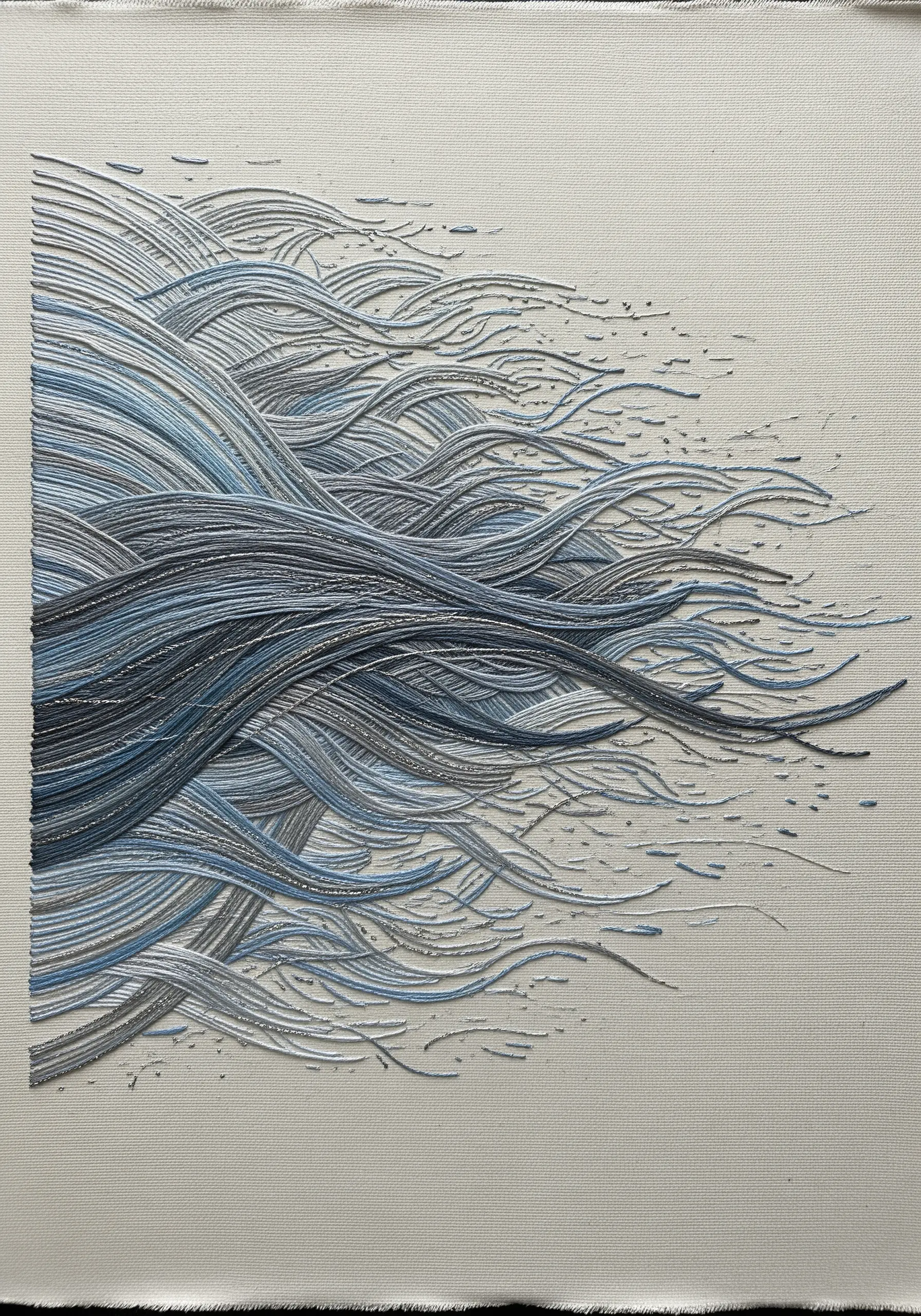 Abstract embroidery of flowing water currents in shades of blue and gray on a canvas.
