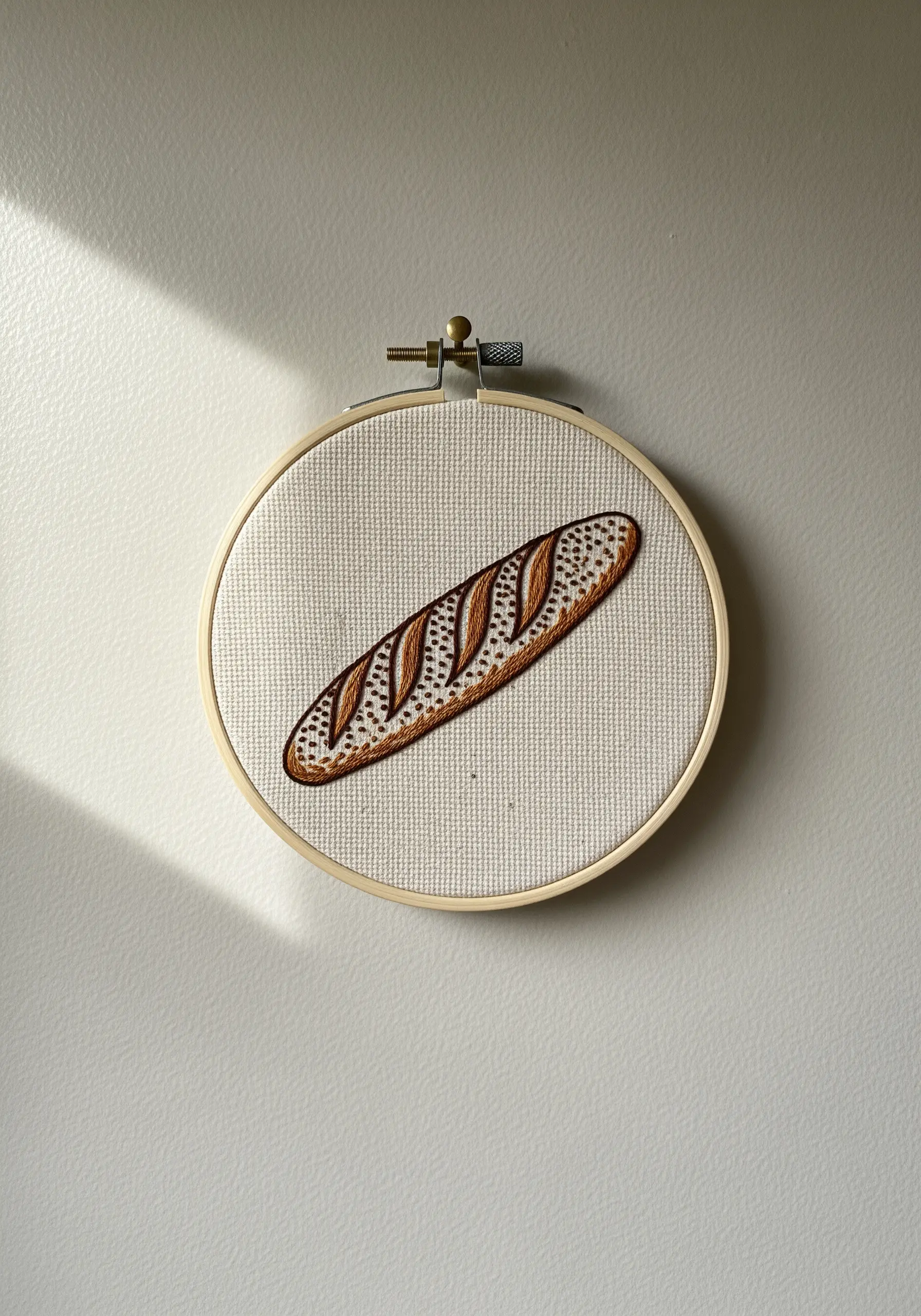 Baguette embroidery using seed stitches for crust texture