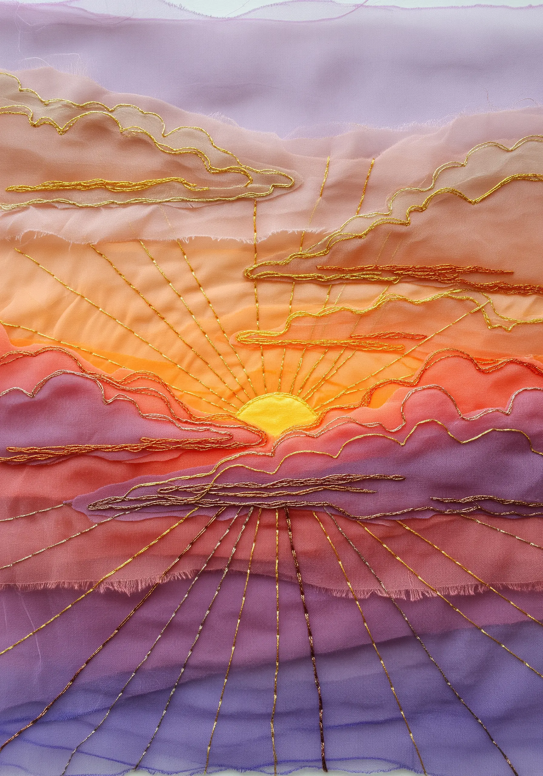 Organza fabric layered sunset with gold thread stitching