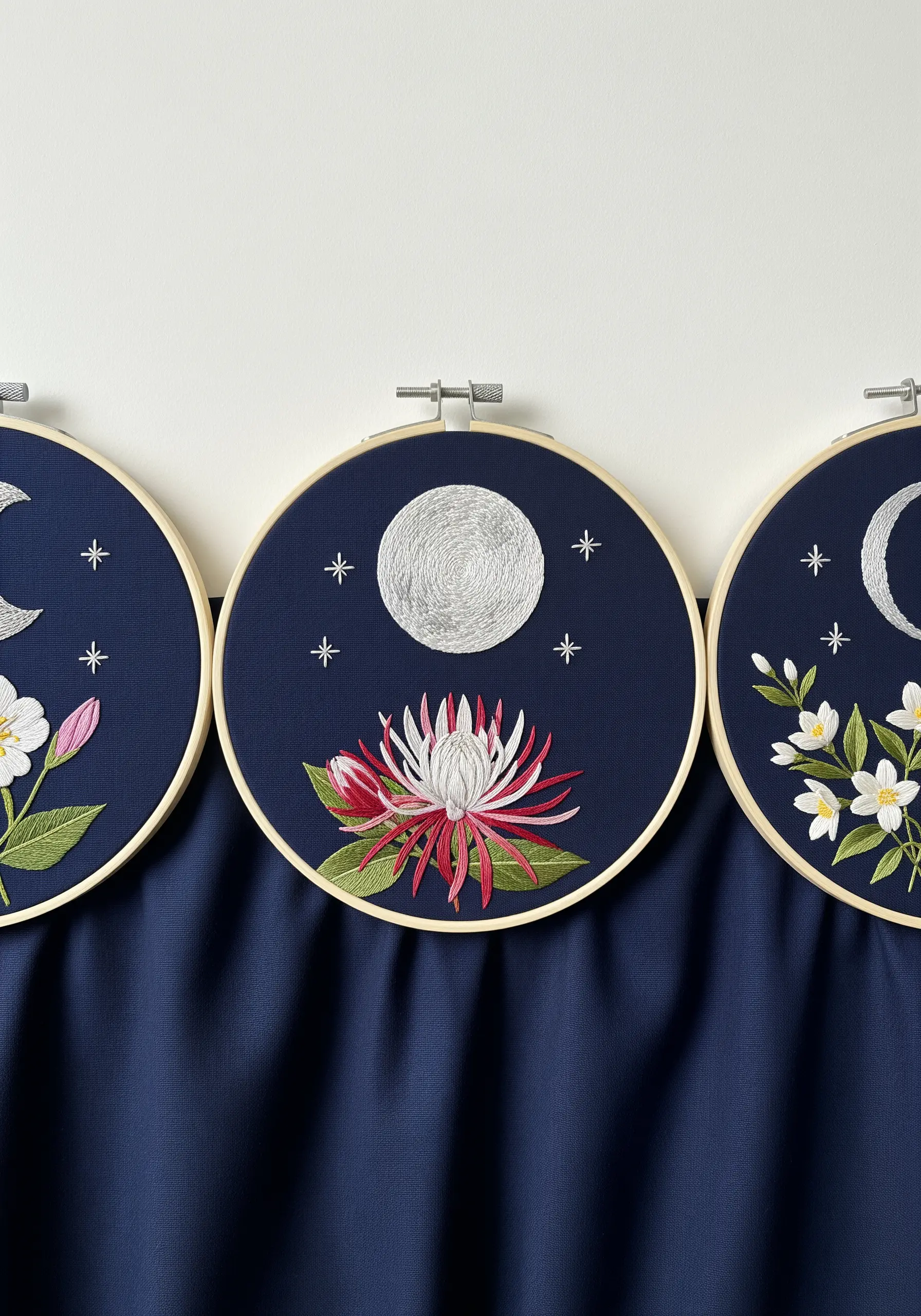 Night-blooming flower triptych featuring different phases of the moon and stars.