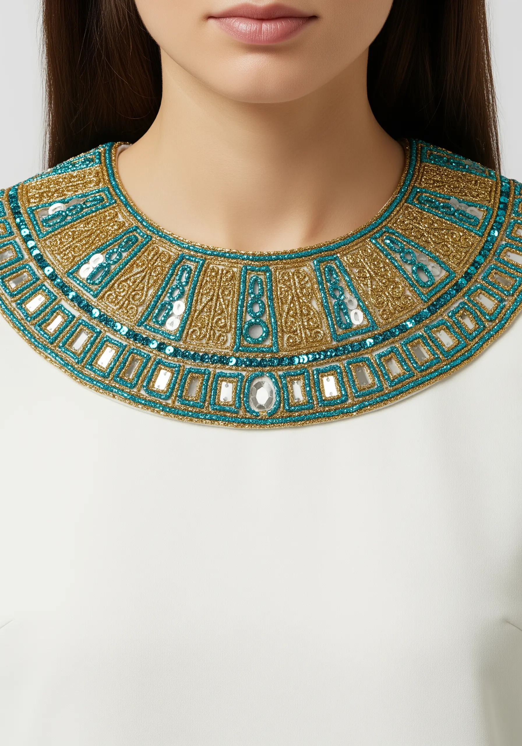 Ornate Egyptian-style collar with gold glitter thread, turquoise beads, and silver sequins.