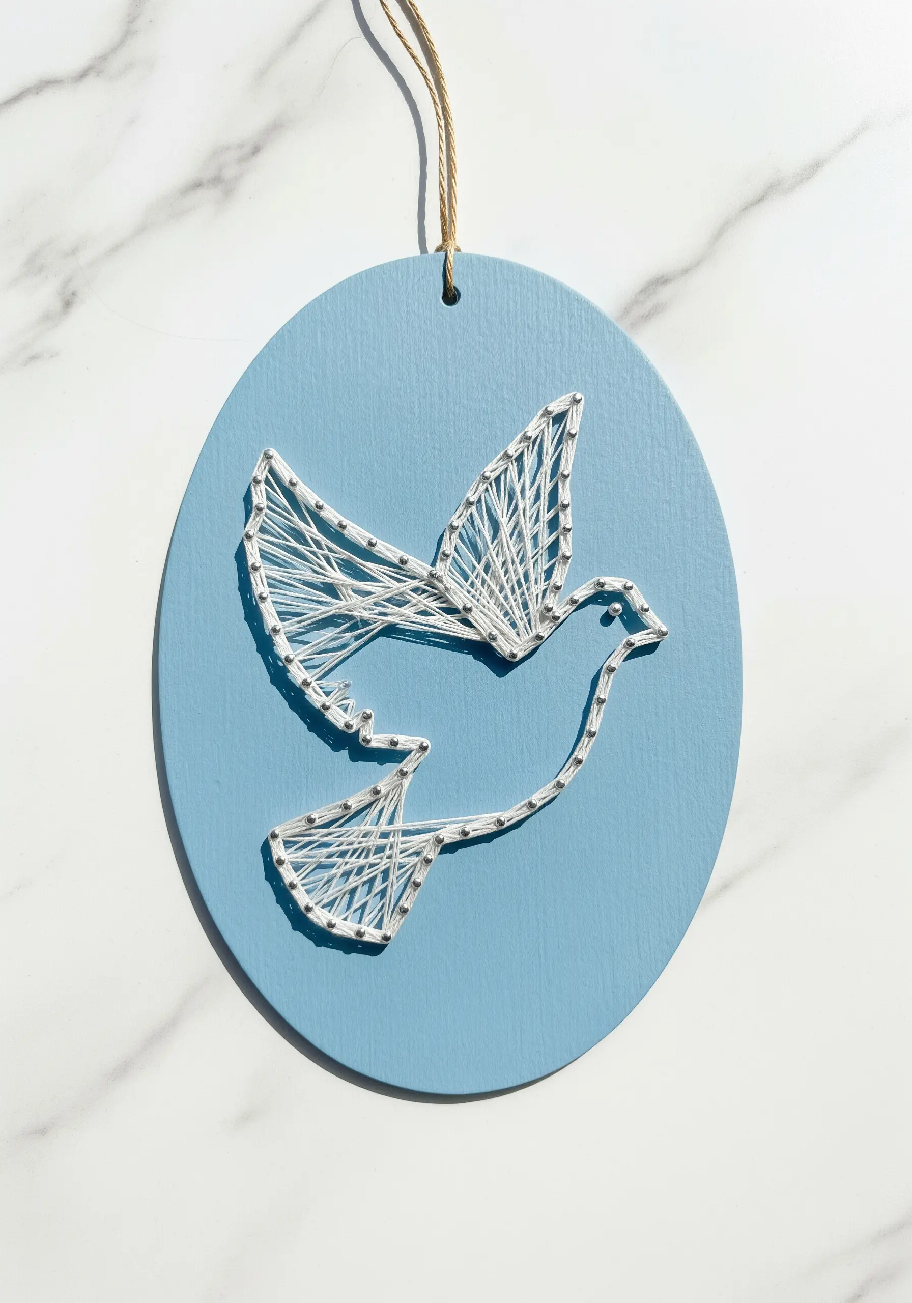 Minimalist white string art dove on a light blue circular background.
