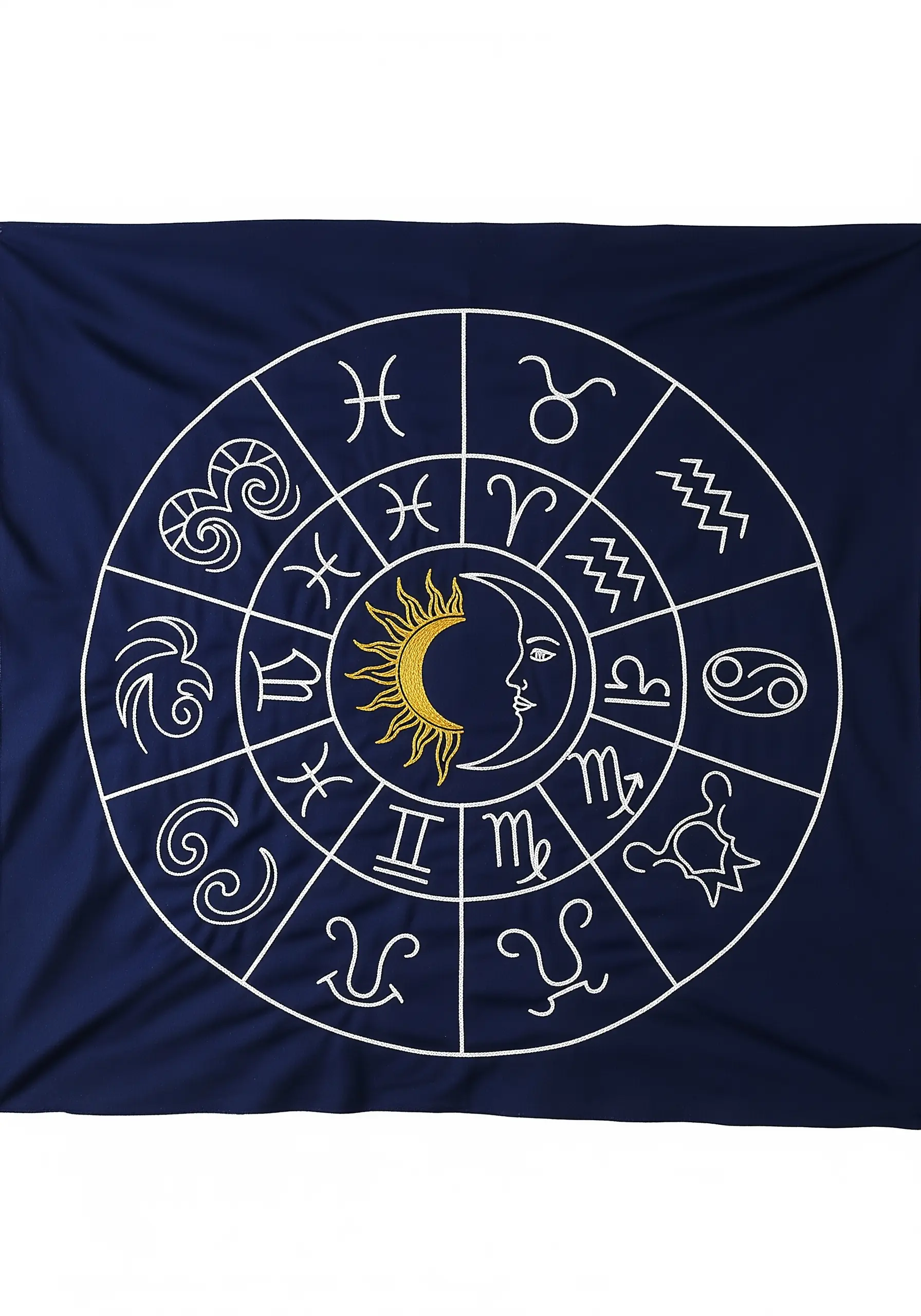 A complete zodiac wheel embroidered in white and gold thread on a large navy blue tapestry.