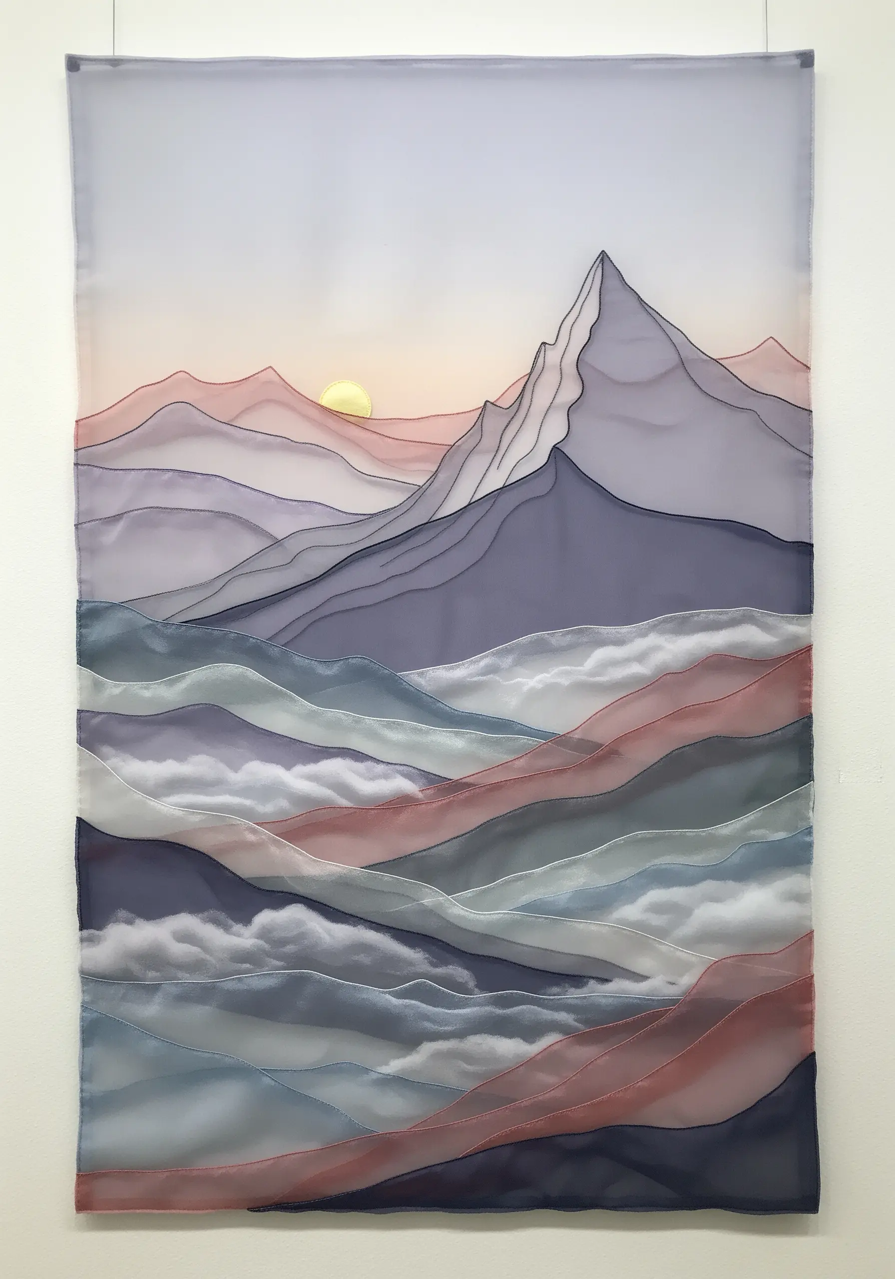 Layered organza and chiffon creating a minimalist mountain landscape.