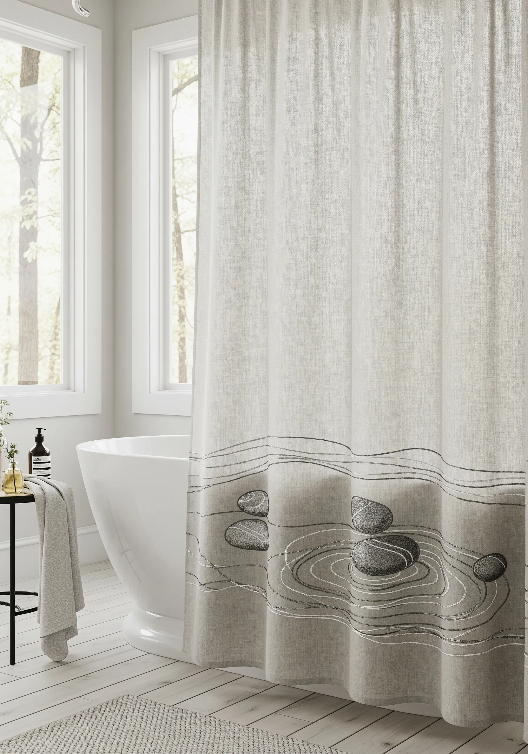 A shower curtain with embroidered zen stones and delicate, transparent water ripples.