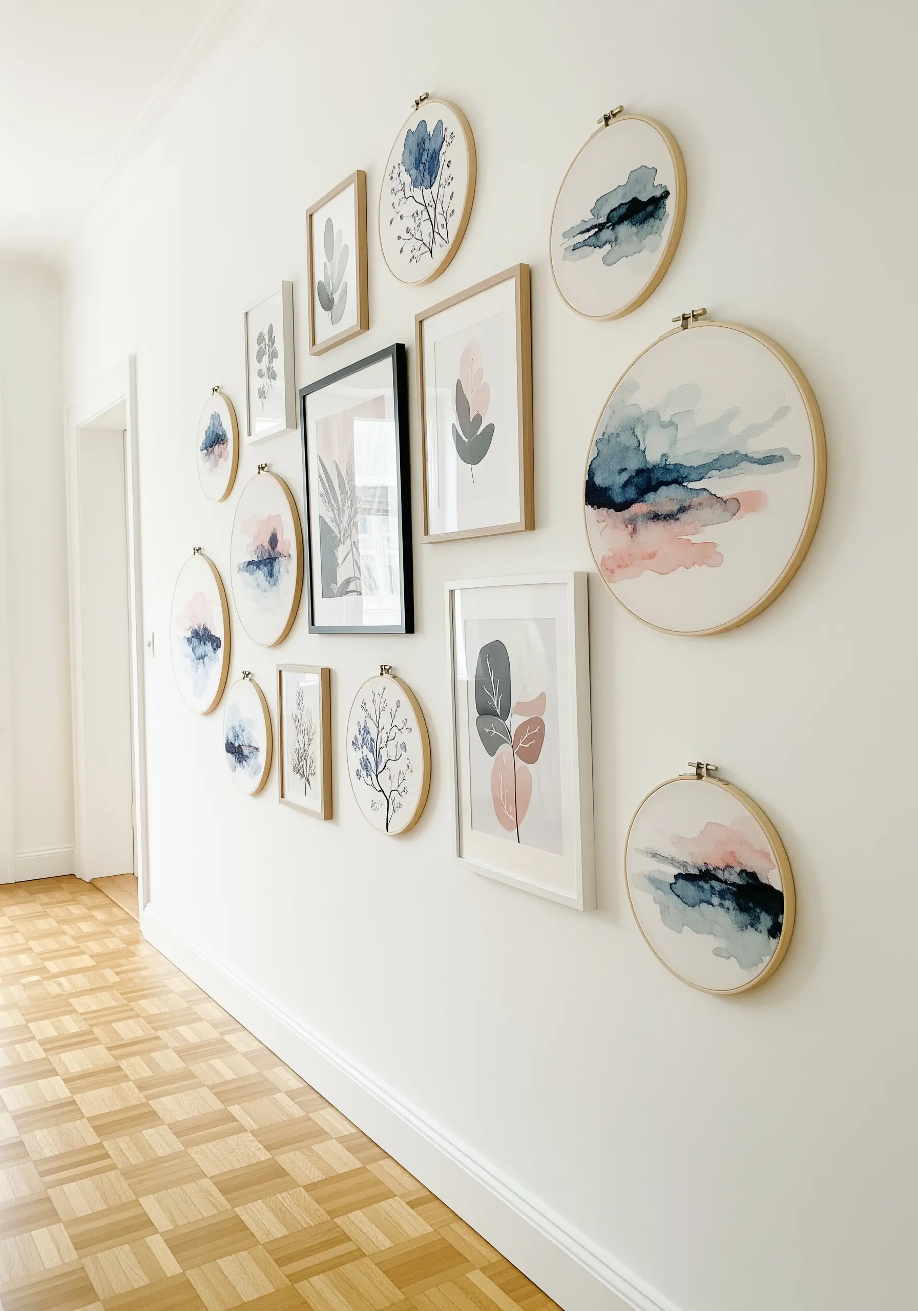 Gallery wall of embroidery hoops with watercolor abstract designs