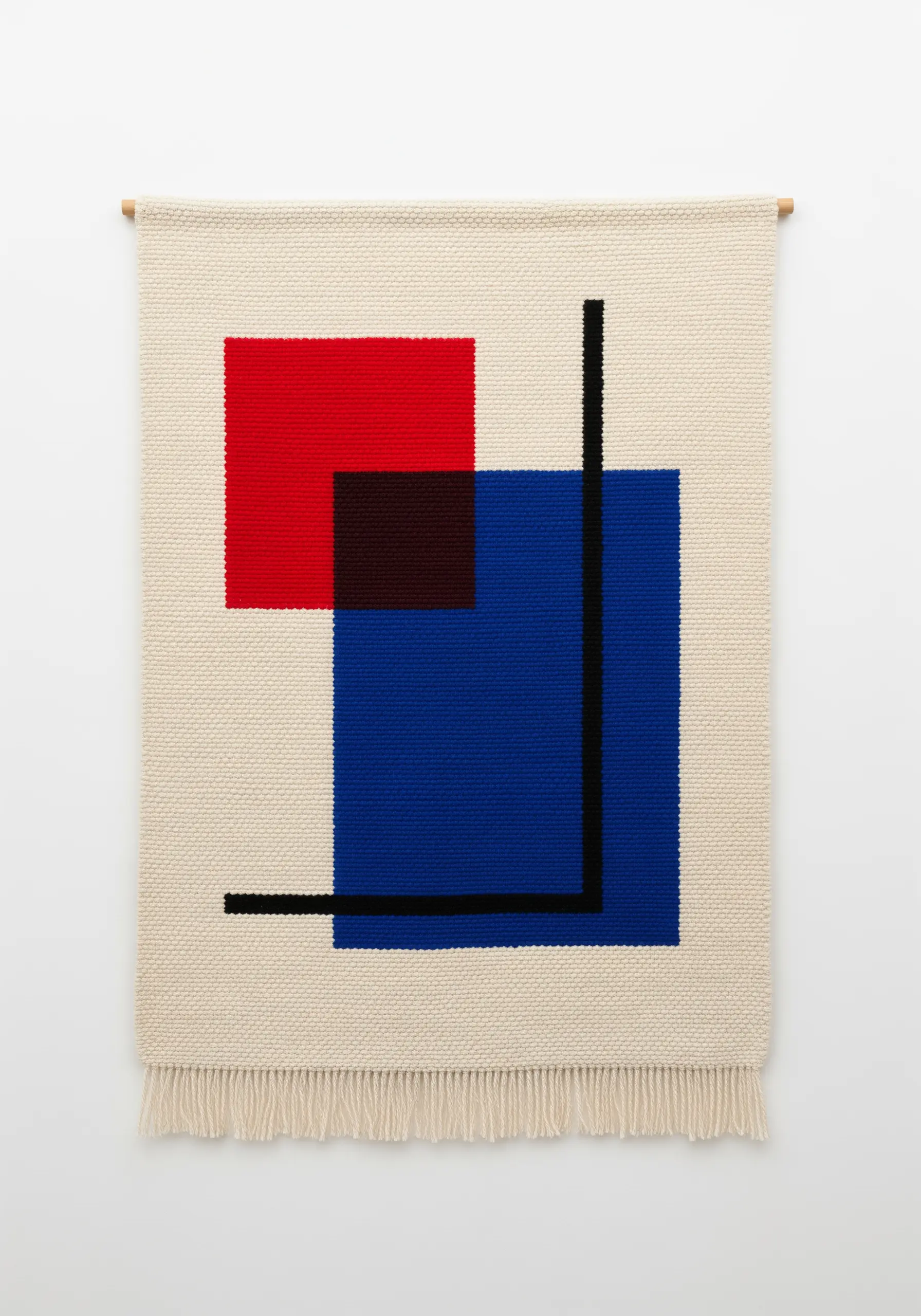 A woven wall hanging inspired by Piet Mondrian, with red and blue squares and black lines.